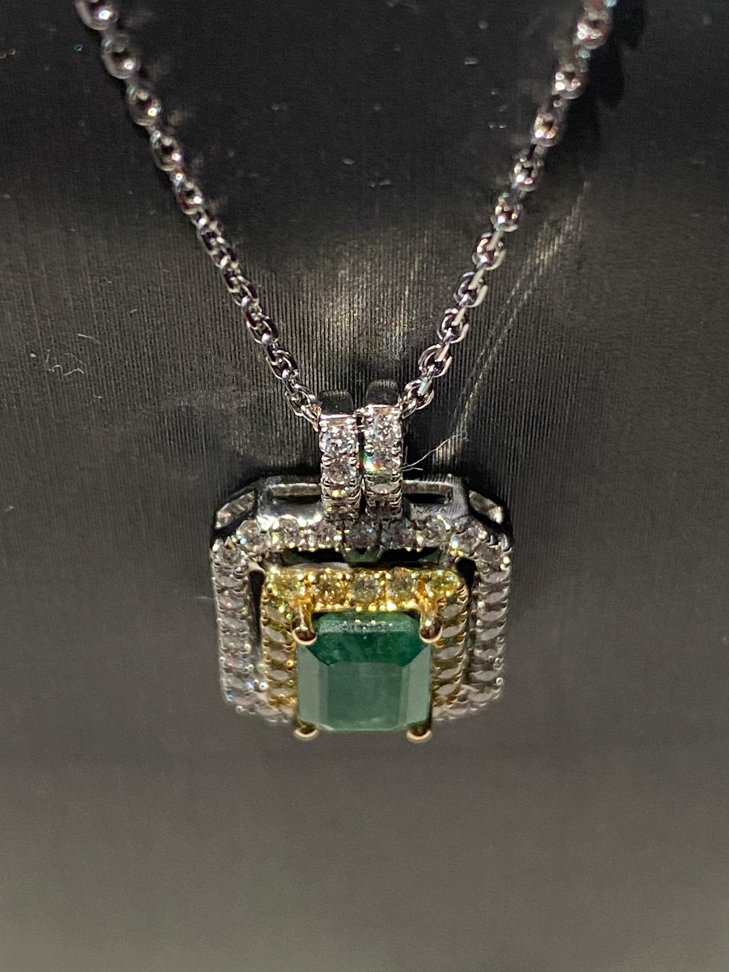 Artisan 1.45 Carat Emerald Cut Emerald Diamond Halo Pendant For Sale