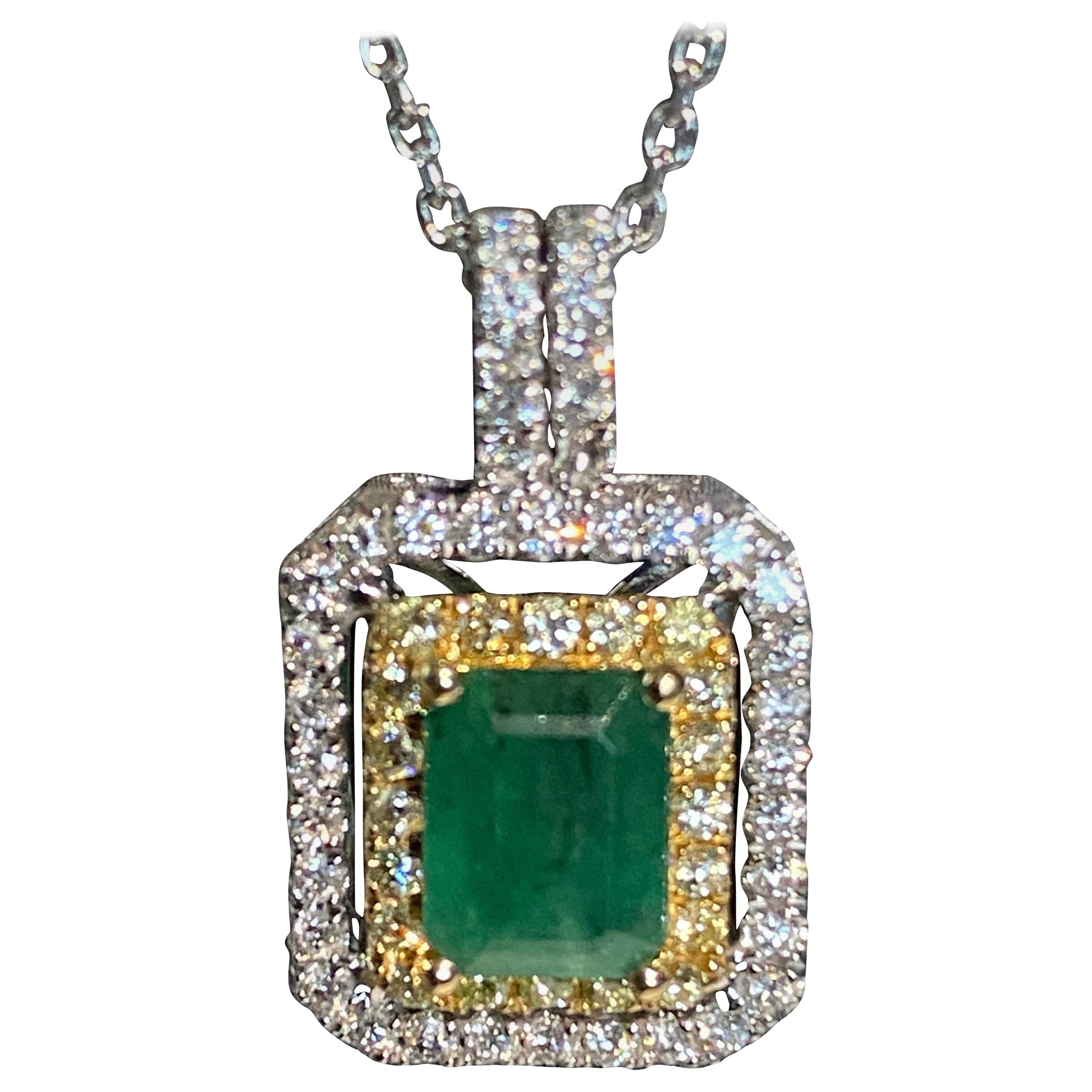 1.45 Carat Emerald Cut Emerald Diamond Halo Pendant For Sale
