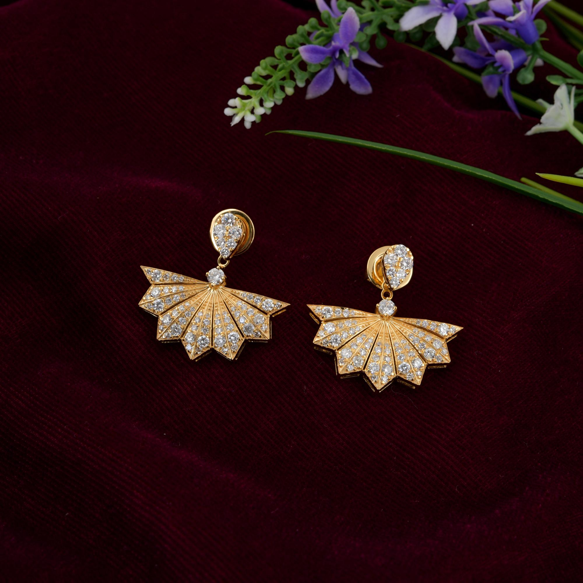 Cast from 14-karat gold, these exquisite earrings are handset with 1.45 carats of sparkling diamonds.

FOLLOW SPECTRUM JEWELS storefront to view the latest collection & exclusive pieces. Spectrum Jewels is proudly rated as a Top Seller on 1stdibs