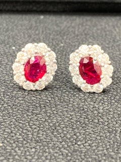 1.45 Carat Oval Cut Ruby and Diamond Stud Earrings in 18K White Gold