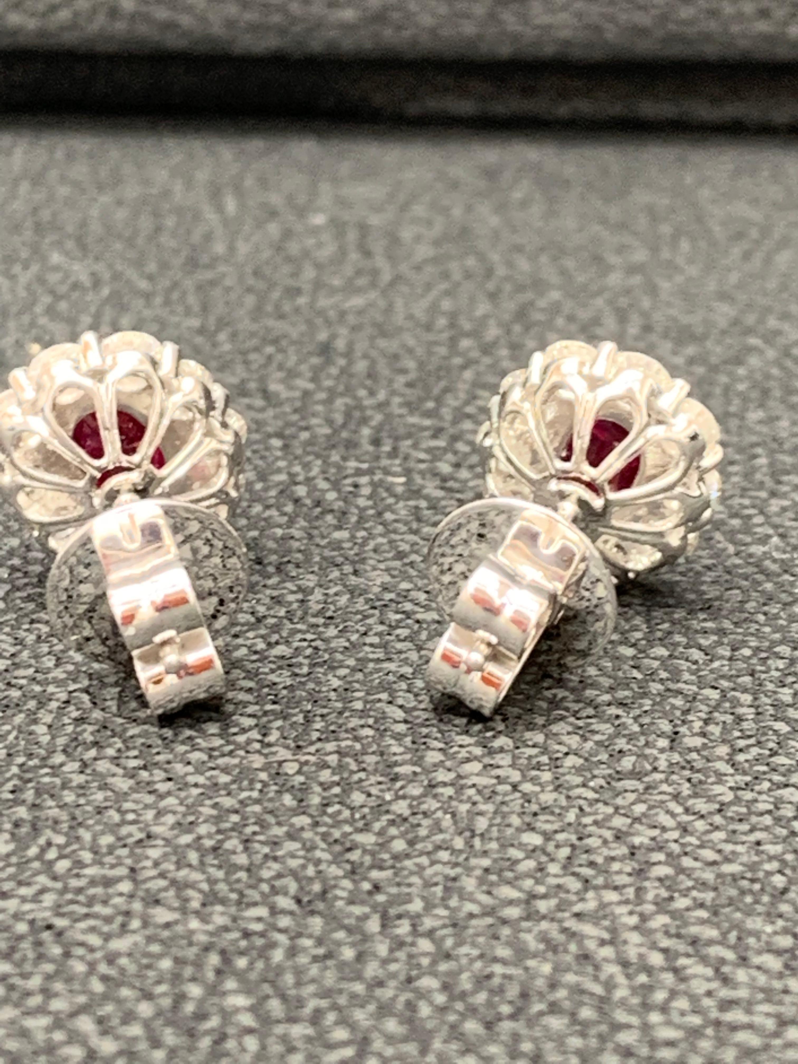 Women's or Men's 1.45 Carat Oval Cut Ruby and Diamond Stud Earrings in 18K White Gold For Sale
