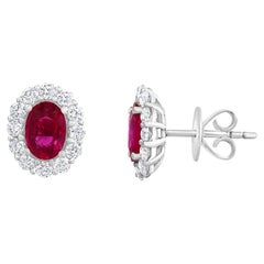 1.45 Carat Oval Cut Ruby and Diamond Stud Earrings in 18K White Gold