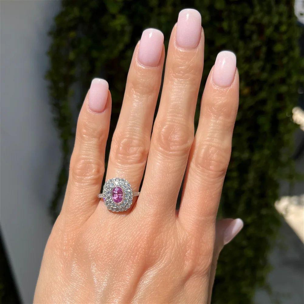Modern 1.45 Carat Oval Pink Sapphire and OEC Diamond Vintage Platinum Double Halo Ring For Sale