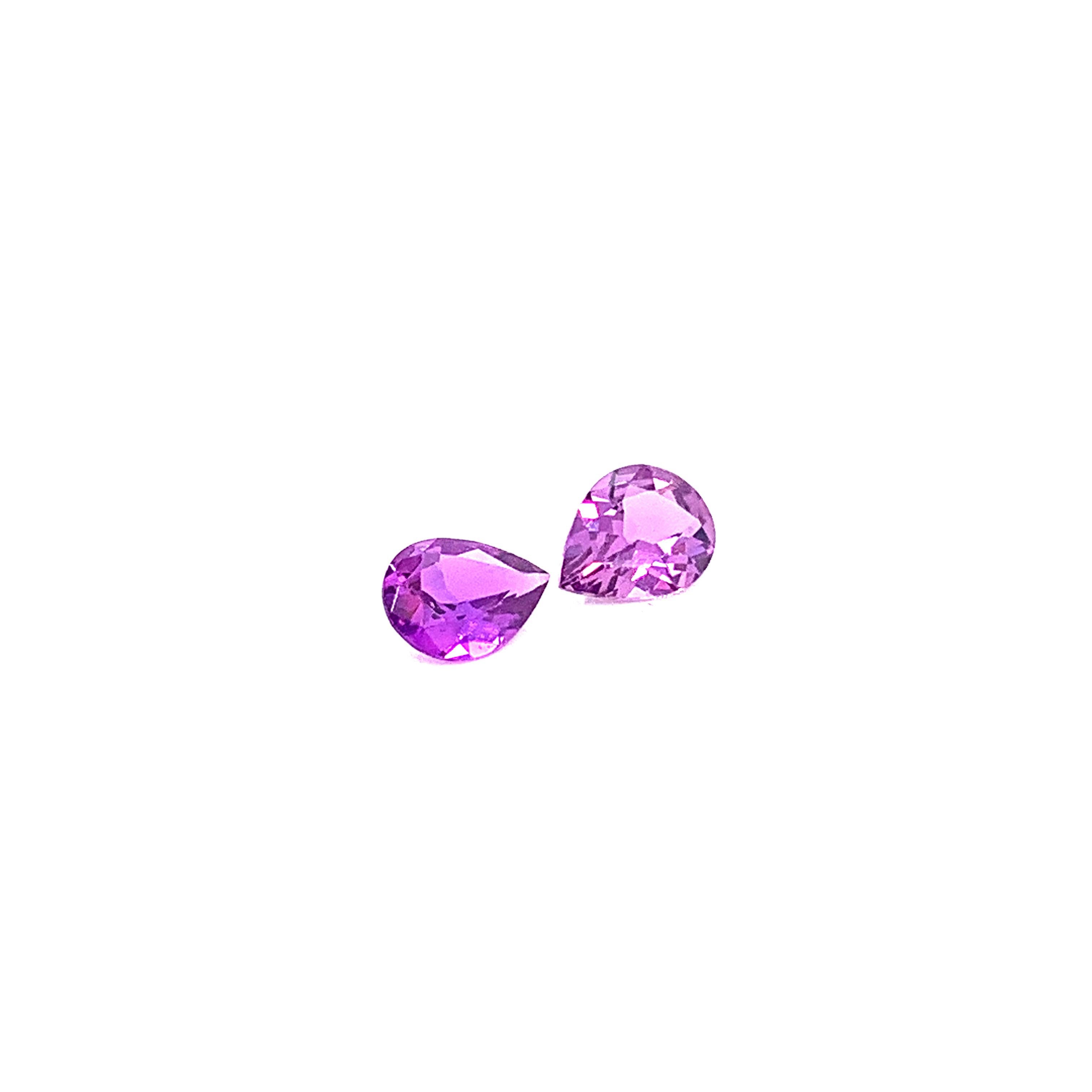1.45 Carat Pear Shaped Purple Sapphire Pair: 

A very beautiful and elegant pair, it features two natural pear-shaped purple sapphires weighing a total of 1.45 carat. The sapphires have excellent cutting proportions, and possess fine colour