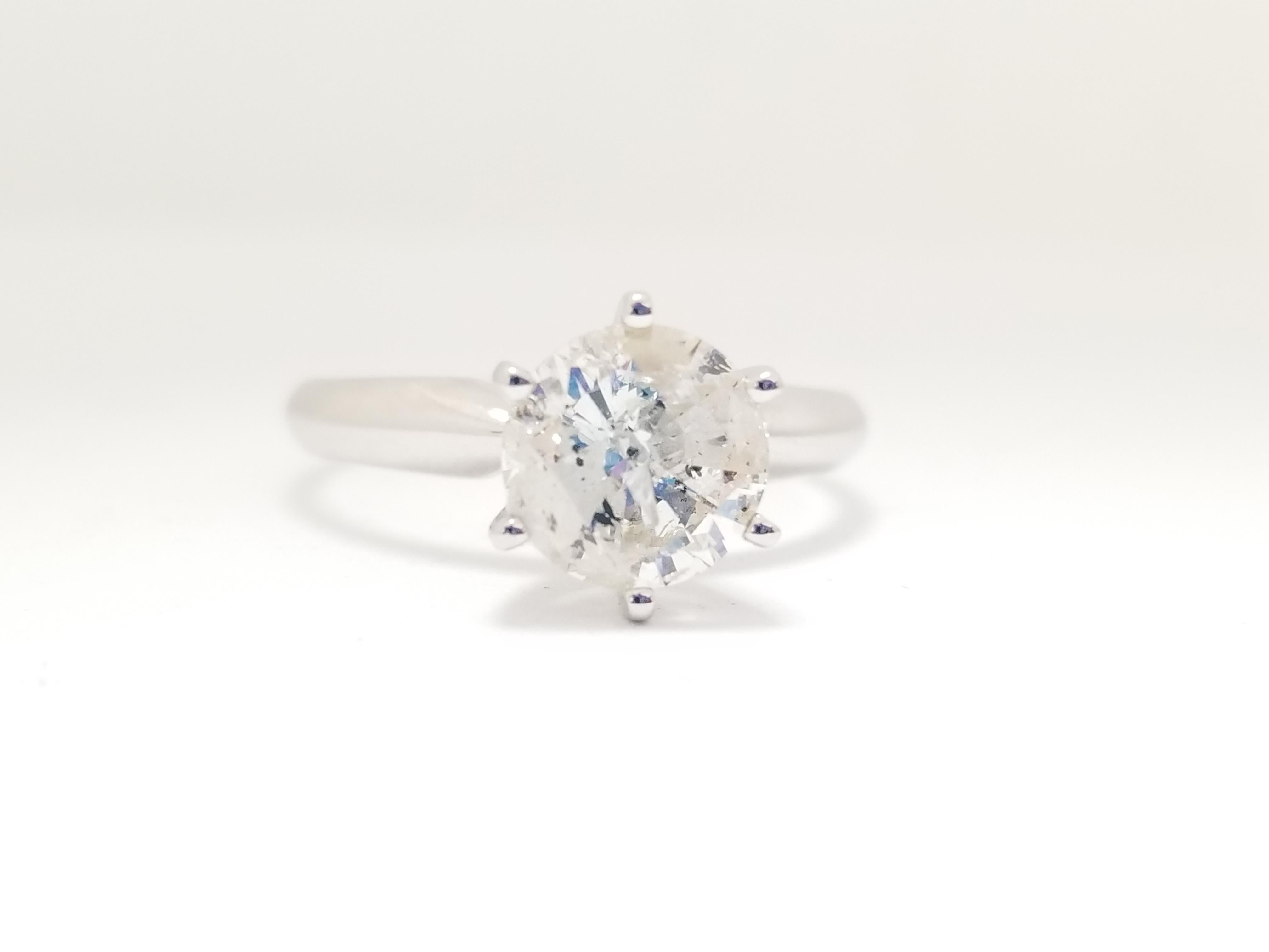 Gorgeous looking natural 1.45 Carats diamond set on a 6 prong white gold 14 Karat Ring. Sparkling, Shiny. Ring Size 7.25