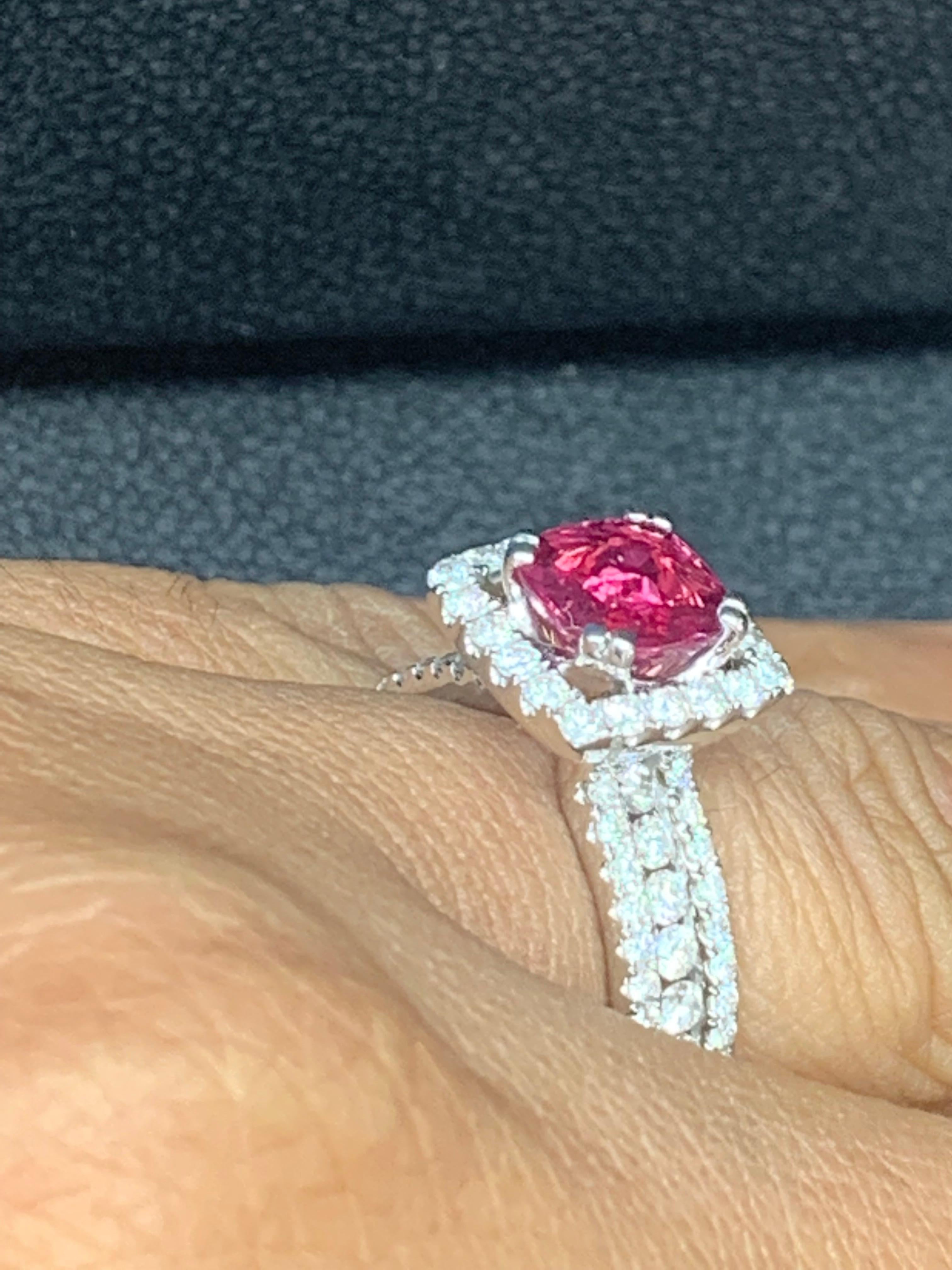 1.45 Carat Round Shape Ruby and Diamond Halo Ring in 18K White Gold In New Condition For Sale In NEW YORK, NY