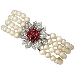 1950s 1.45 Carat Ruby and 2.02 Carat Diamond Pearl and White Gold Bracelet