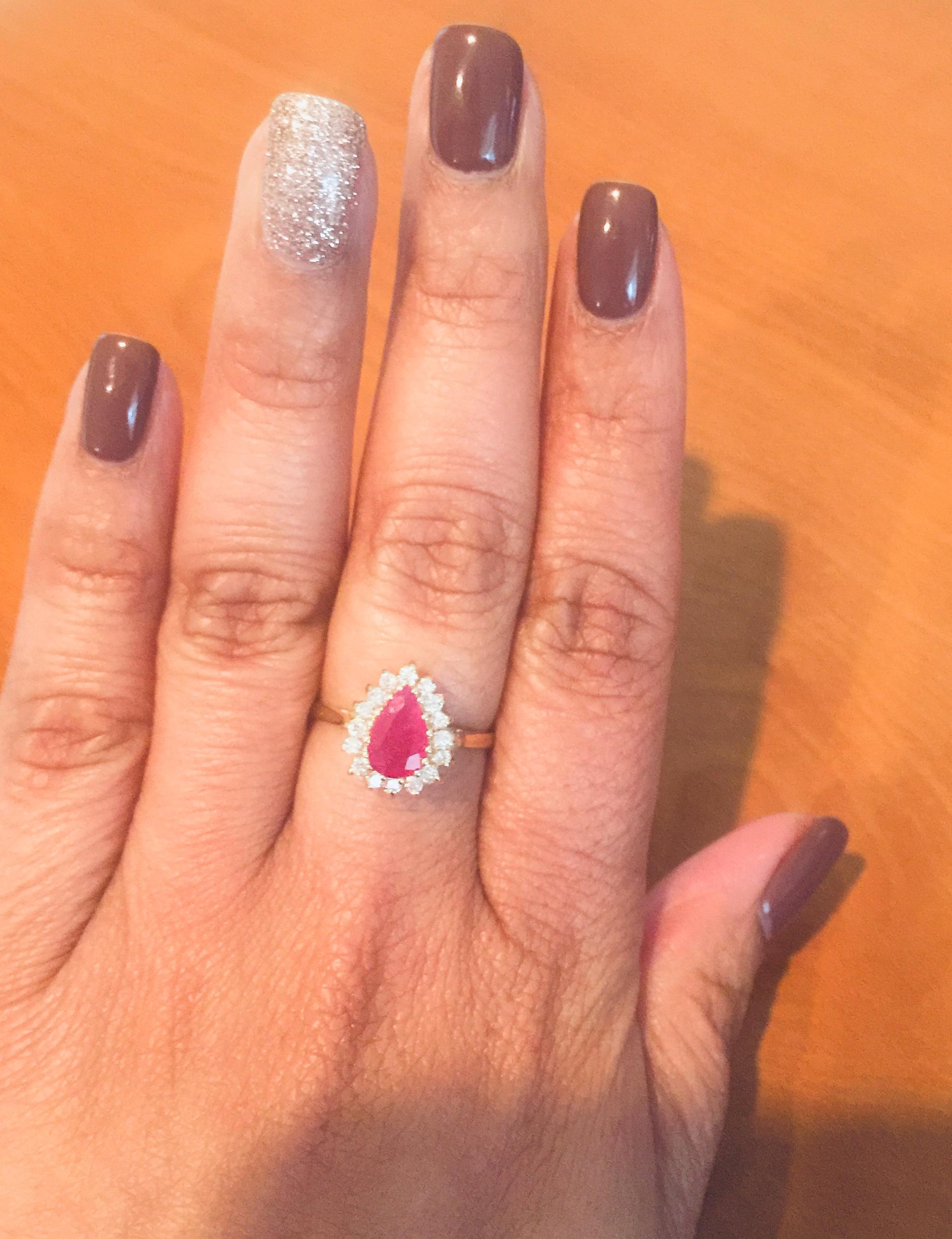 Pear Cut 1.45 Carat Ruby Diamond 14 Karat Yellow Gold Ring For Sale