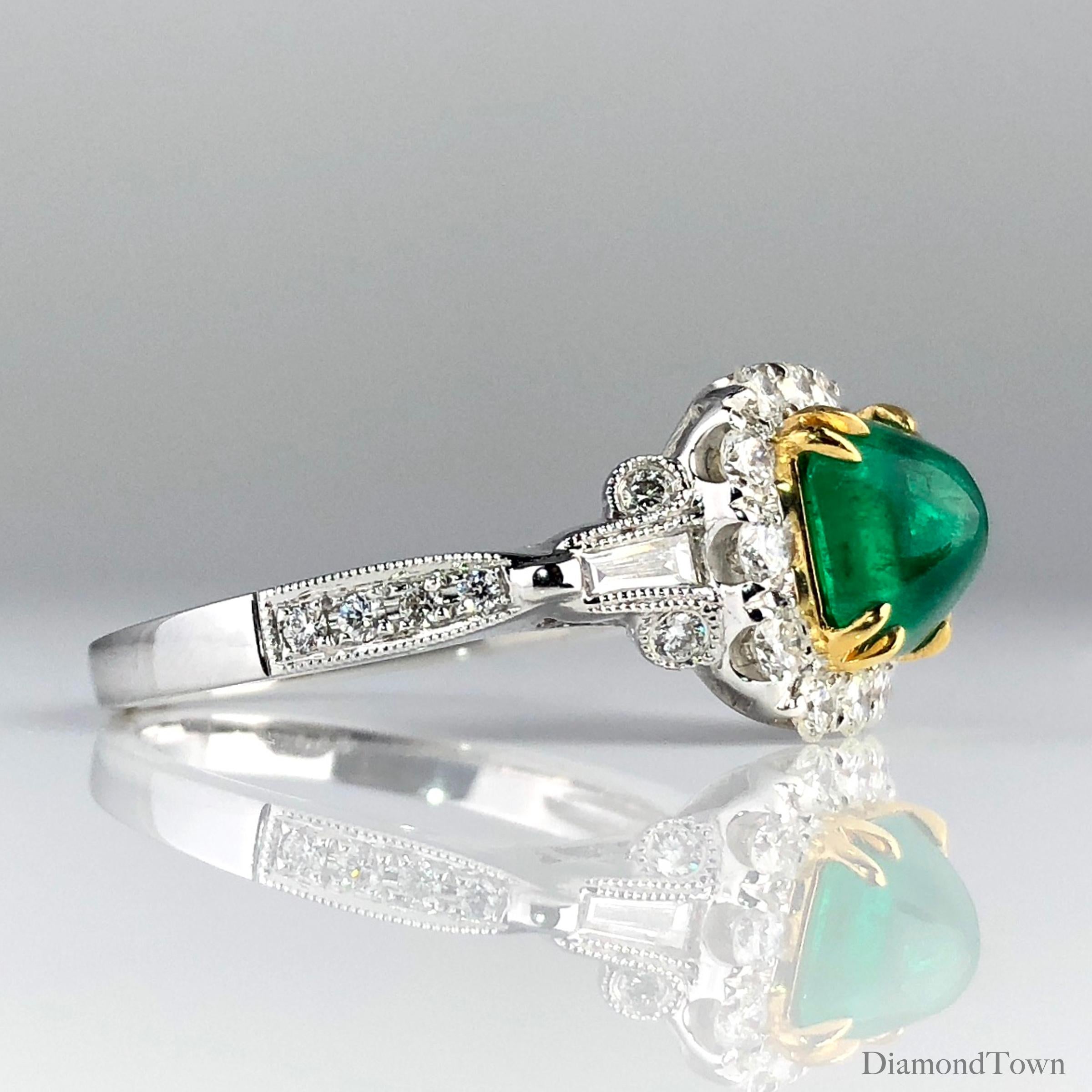 (DiamondTown) This ring features a 1.45 carat sugarloaf Emerald center, surrounded by a square halo of round white diamonds. Two tapered baguettes and additional round diamonds lead down the side shank, bringing the total diamond weight to 0.79