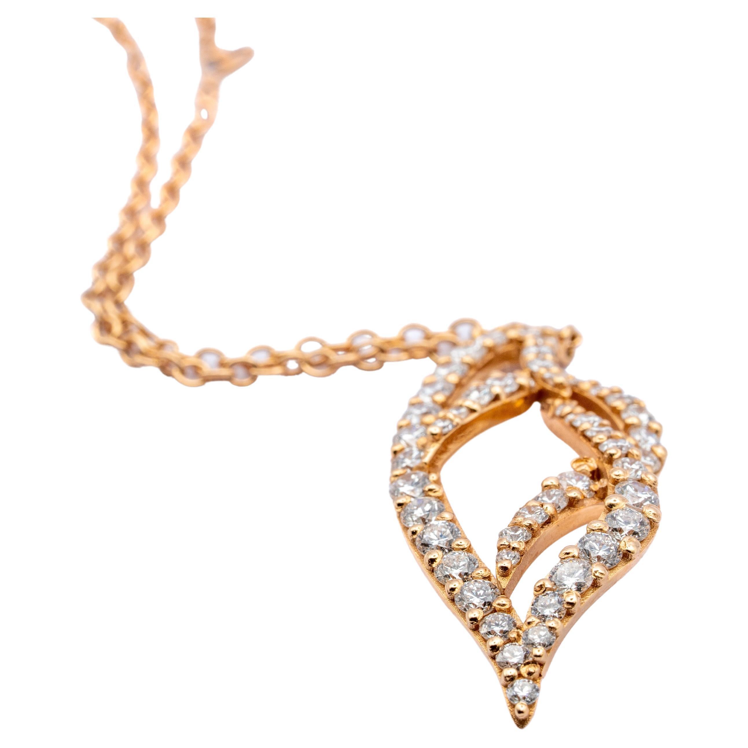This wonderful Leo Milano pendant from our Solari collection shows in every detail a very complicate yet perfectly done workmanship. The pendant and the chain are in 18 carat rose gold .The object weights 7.89 grams diamonds VS G clour for 1.45