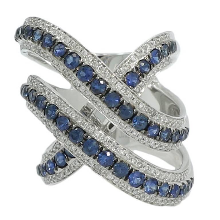 1.45 Carat White Gold Cross over Diamond and Sapphire Ring For Sale
