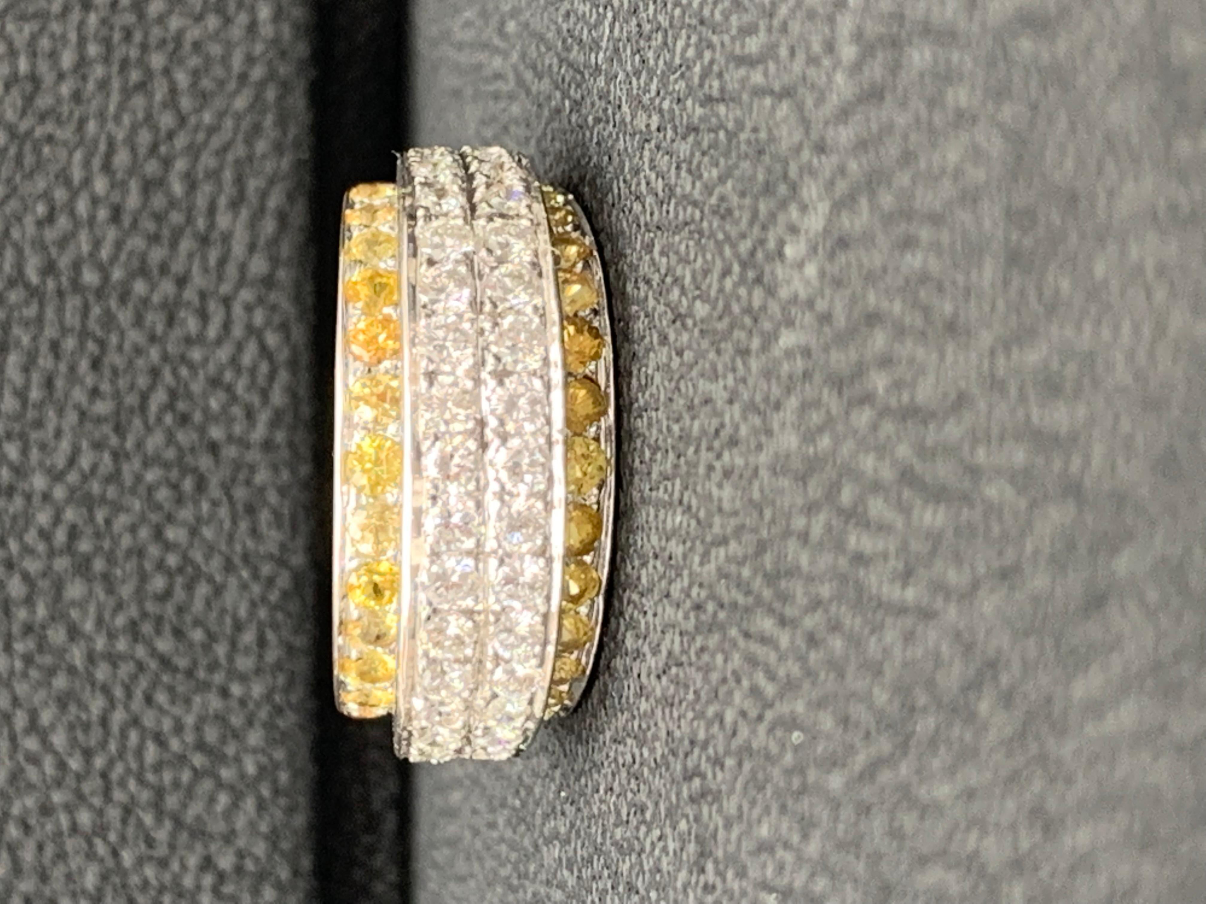 This fashion ring features round 34 yellow sapphires weighing 1.45 carats and 42 brilliant round diamonds weigh 1.12 carat. Made in 18k white gold. Can be used as a fashion piece as well. 
Size 6.5 US (Sizable). One of a Kind  piece.
All diamonds