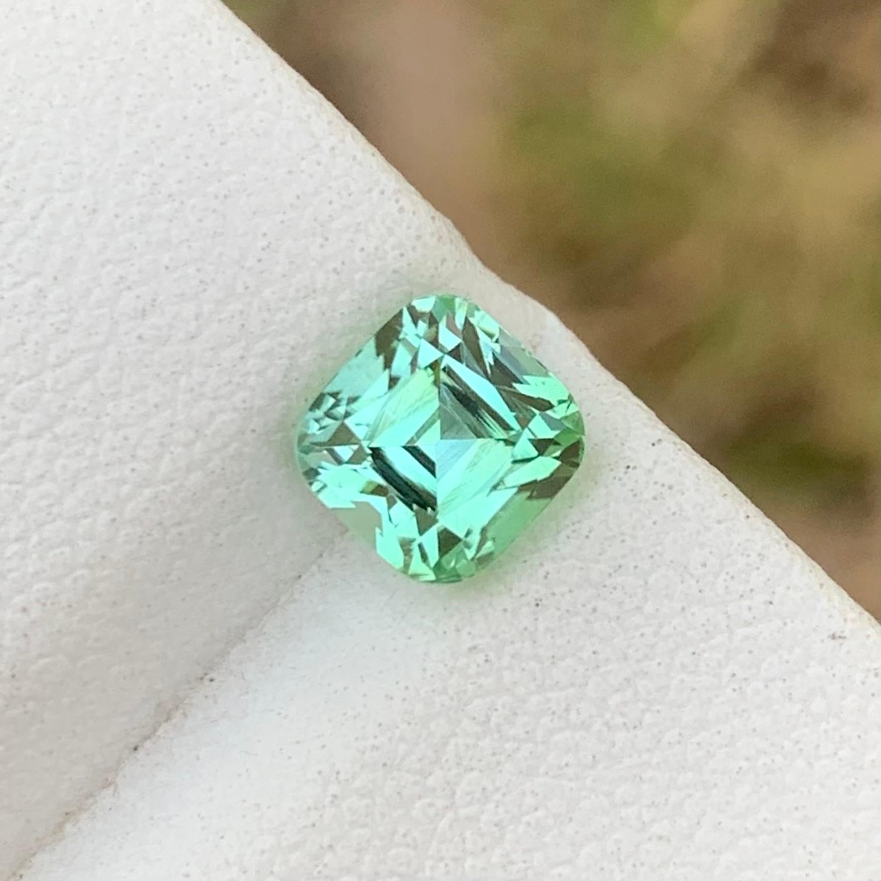 Loose Mint Tourmaline 
Weight: 1.45 Carats 
Dimension: 6.1x5.9x5.5 Mm
Origin: Kunar Afghanistan 
Shape: Cushion 
Color: Mint
Treatment: Non
Certificate: On Demand 
Mint tourmaline is a captivating variety of the tourmaline gemstone family known for