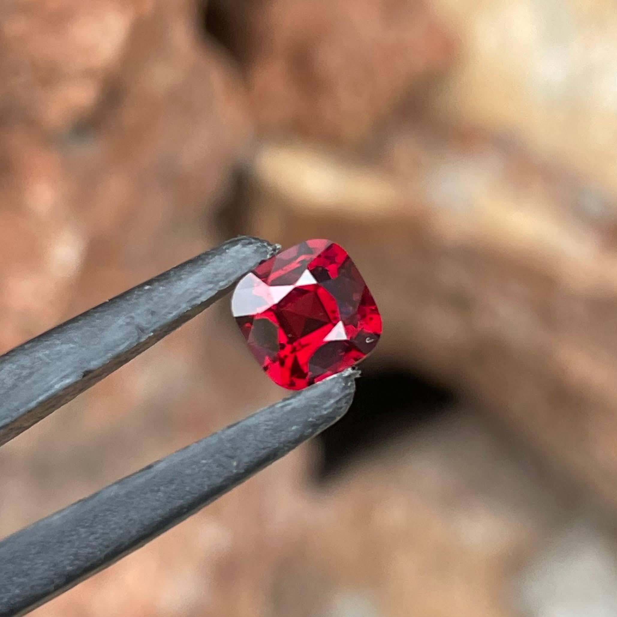 Weight 1.45 carats 
Dimensions 6.35x6.35x4.25 mm
Treatment none 
Origin Burma 
Clarity VVS
Shape cushion 
Cut fancy cushion 




Behold the allure of this exquisite 1.45 carats Natural Red Burmese Spinel, a gemstone of unparalleled beauty and