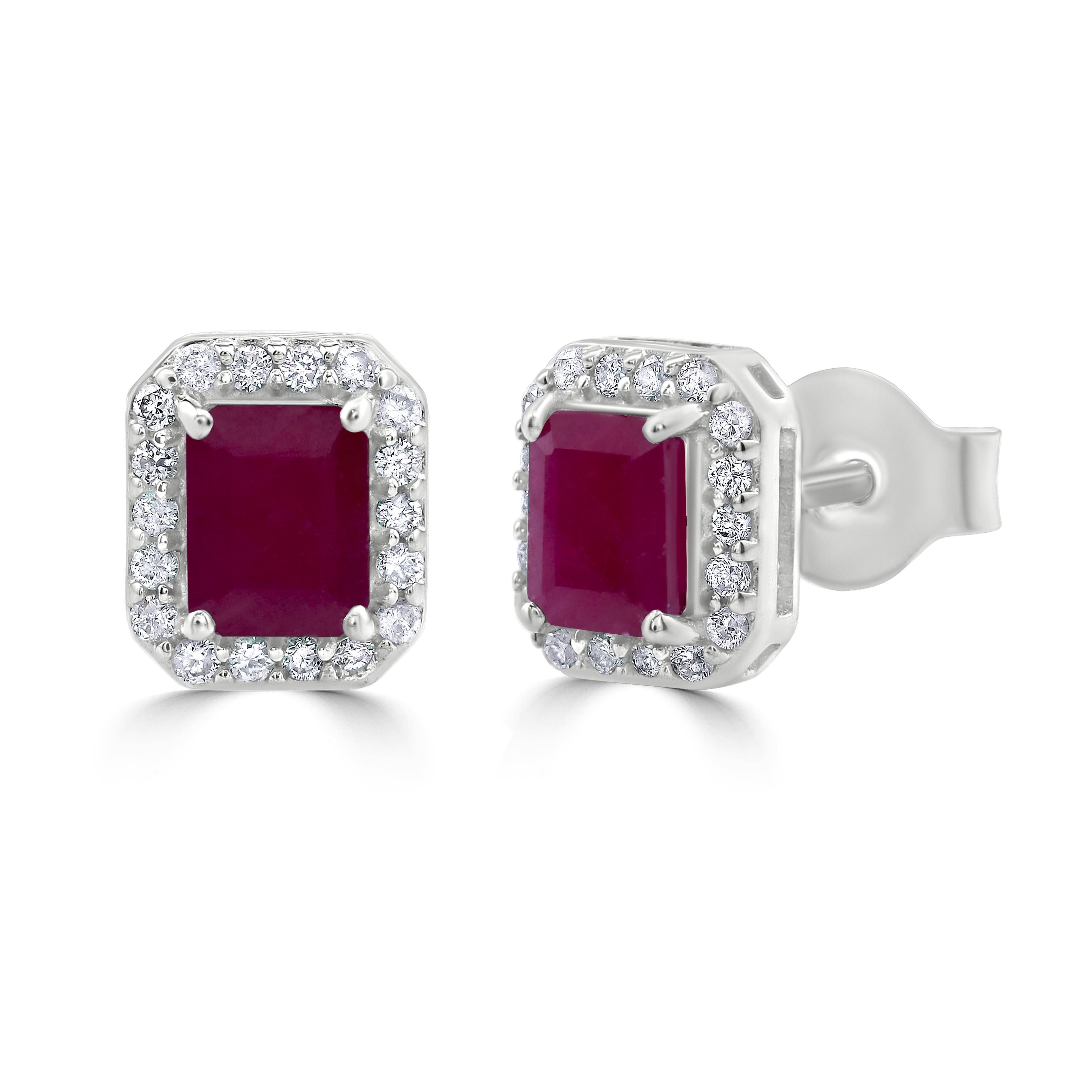 Some of the world's most desirable gemstones come together for this gemstone earring ! These Gemistry stud earrings boast of 1.45 carat octagon rubies at the center in four prongs accentuated by a halo of round and brilliant cut diamonds, prong set