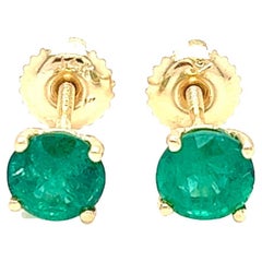 1.45 carats round Emerald Stud Earrings in 14K Yellow Gold.