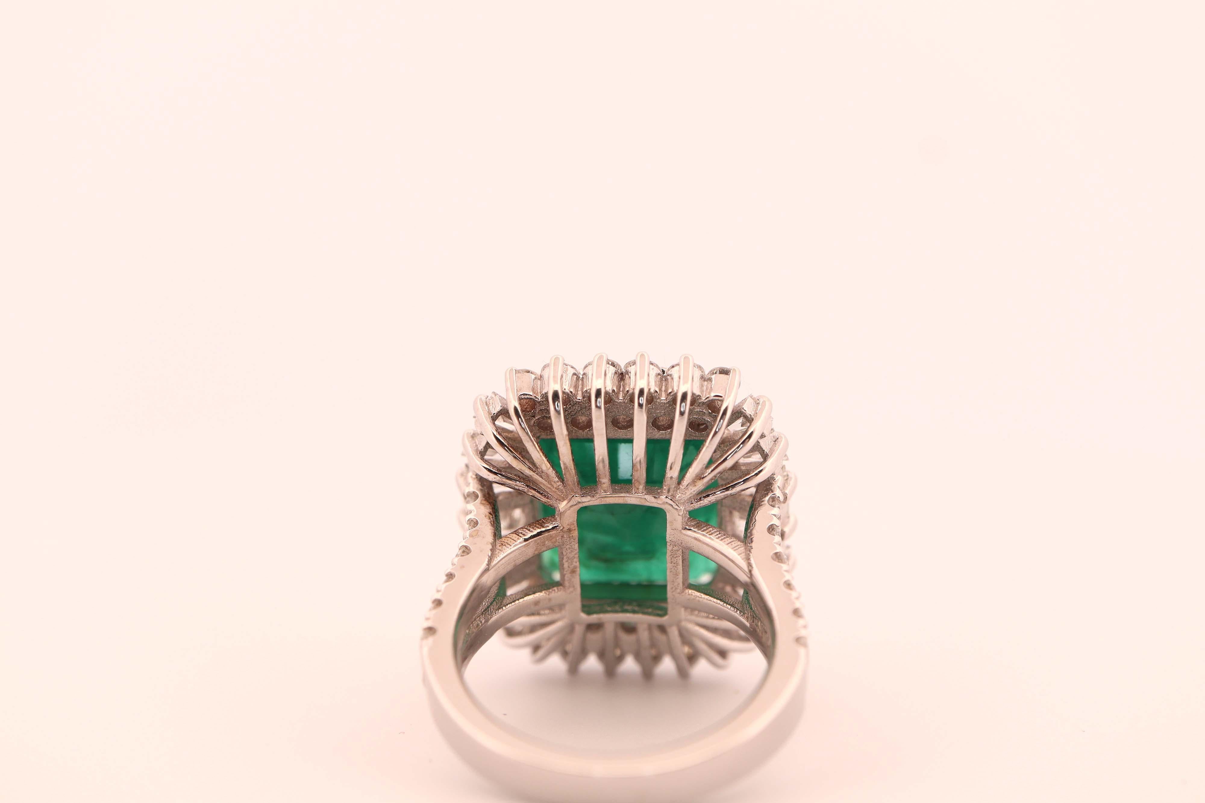 Contemporary 14.5 Carat Emerald and 3.16 Carat Diamond Ring For Sale