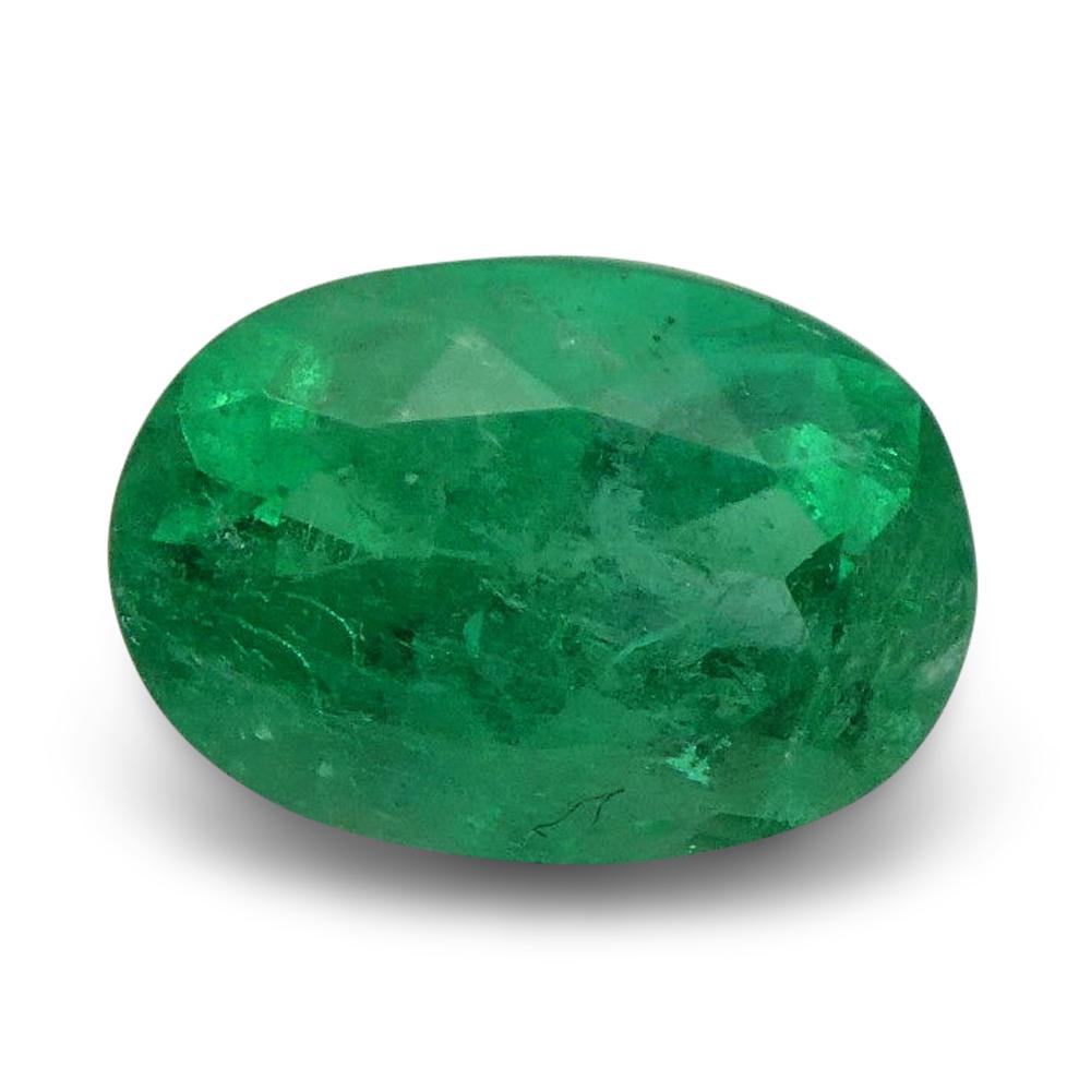 This is a stunning GIA Certified Emerald

The GIA report reads as follows:

GIA Report Number: 2193480064
Shape: Oval
Cutting Style Crown: Brilliant Cut
Cutting Style Pavilion: Modified Brilliant Cut
Transparency: Transparent
Color: Green
Species: