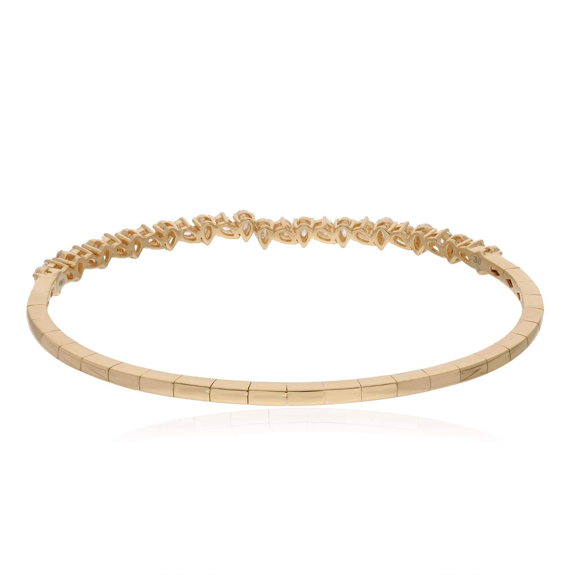 Made from solid 18k gold, this Bangle Bracelet features a stunning array of pear-shaped diamonds that catch the light beautifully and sparkle with every movement. The bangle is available in 10k/14k/18k, Rose Gold/Yellow Gold/White Gold.

This is a