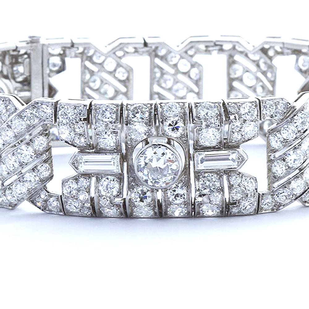 An elaborate hand crafted Art Deco mixed-cut diamond in platinum bracelet with three old European diamond center stones. A fine period bracelet with a lovely motif and excellent design. 7 inches long , Approx. 14.50 ctw.
French hallmarks.

No.