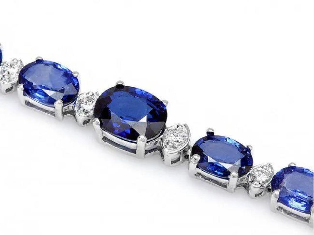 14.50 Natural Blue Sapphire and Diamond 14K Solid White Gold Bracelet

Total Natural Sapphire Weight is: Approx. 13.90 carats 

Sapphires Measure: Approx. 6x4 - 8x6 mm

Sapphire Treatment: Diffusion

Total Natural Round Diamonds Weight: Approx. 0.60