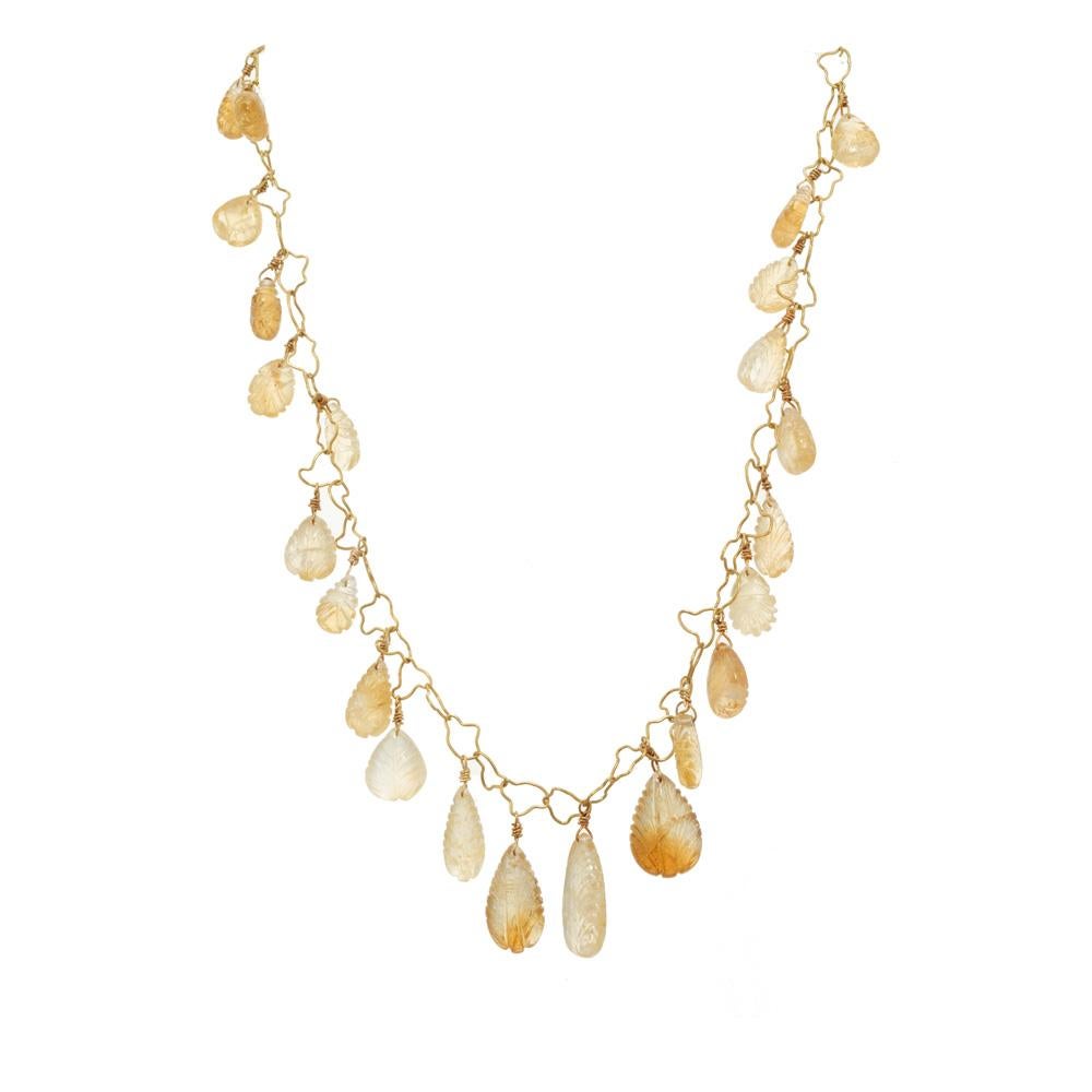 Citrine orange and yellow quartz link necklace. 29 tear drop carved, untreated citrine quartz dangles. Handmade 18k yellow gold necklace with hand shaped links and a hook catch that can shorten the necklace by hooking on any link. Natural untreated