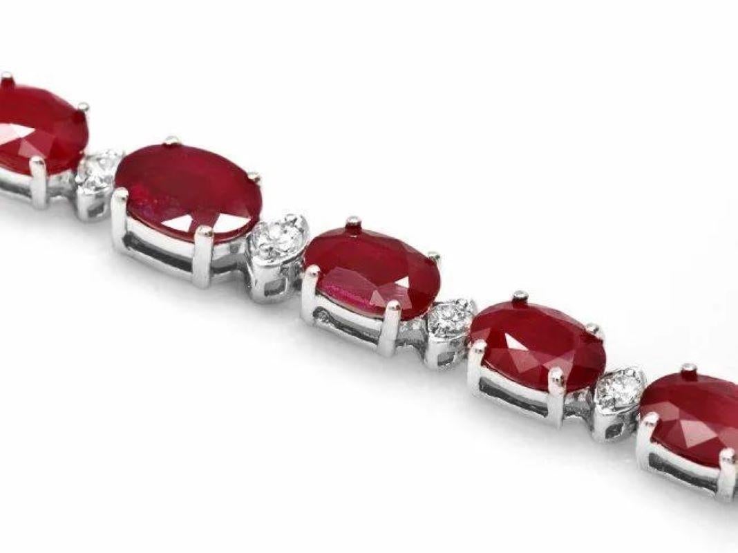 14.50Ct Natural Ruby and  Diamond 14K Solid White Gold Bracelet

Total Natural Ruby Weight is: 13.90 carats 

Ruby  Measures: Approx. 6 x 4/8 x 6 mm 

Ruby treatment: Fracture Filling

Total Natural Round Diamonds Weight: 0.60 Carats (color G-H /
