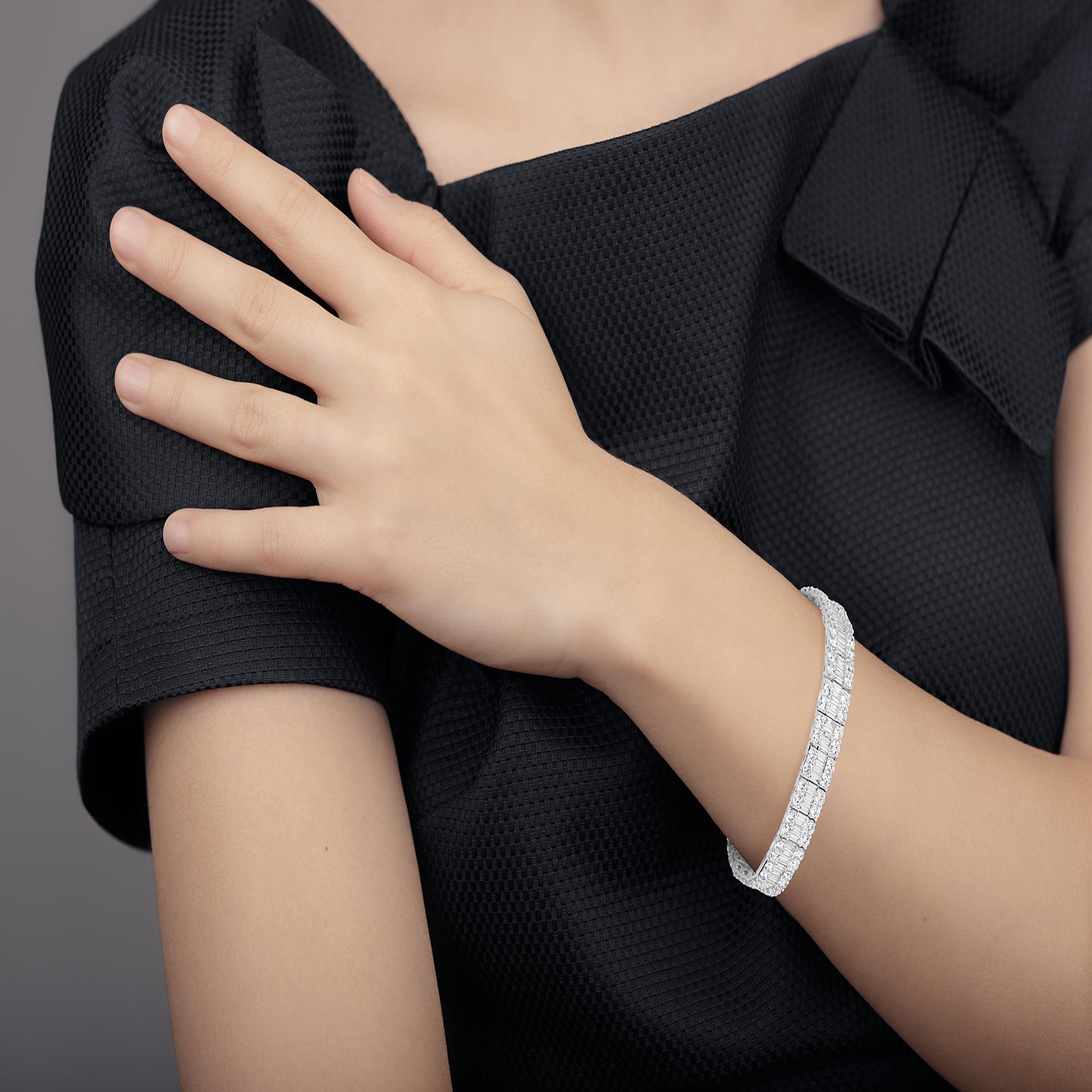 Classy and luxurious Natural Baguette Diamond Bracelet by Almor Designs. This 14.51 Carat Natural Baguette Diamond Bracelet features 9.90 Carats of Round White Diamonds and 4.61 Carats of Baguette Diamonds. All of the diamonds are G-H Color and SI1