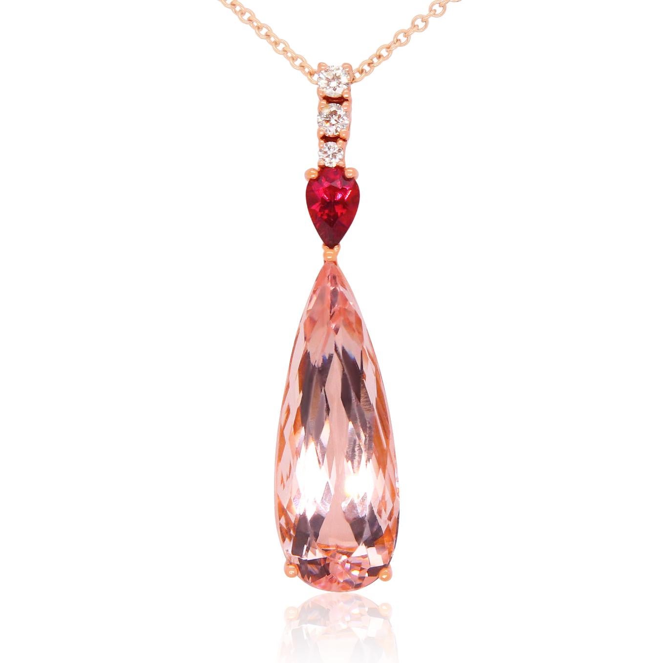 Material: 14k Rose Gold 
Center Stone Detail:  1 Pear Shaped Pink Morganite at 14.58 Carats - Measuring 30x 10 mm
Stone Details: 1 Pear Shaped Pink Tourmaline at 0.68 Carats
Diamond Details: 3 Round White Diamonds at 0.21 Carats - Clarity: SI /