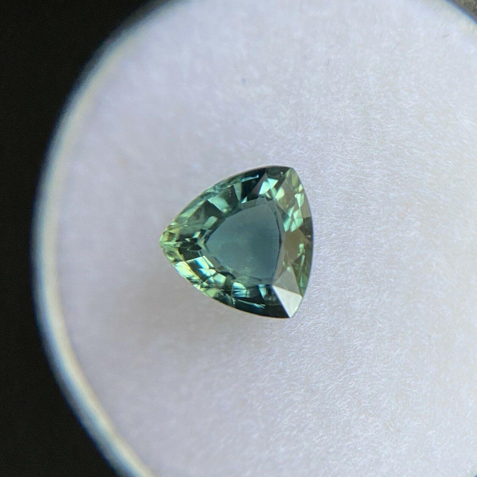 1.45ct Deep Green Blue Australian Sapphire Trillion Triangle Cut Gem 7.2mm

Natural Deep Green Blue Australian Sapphire Gemstone. 
1.45 Carat with a beautiful greenish blue colour and very good clarity, a very clean stone. 
Also has an excellent cut