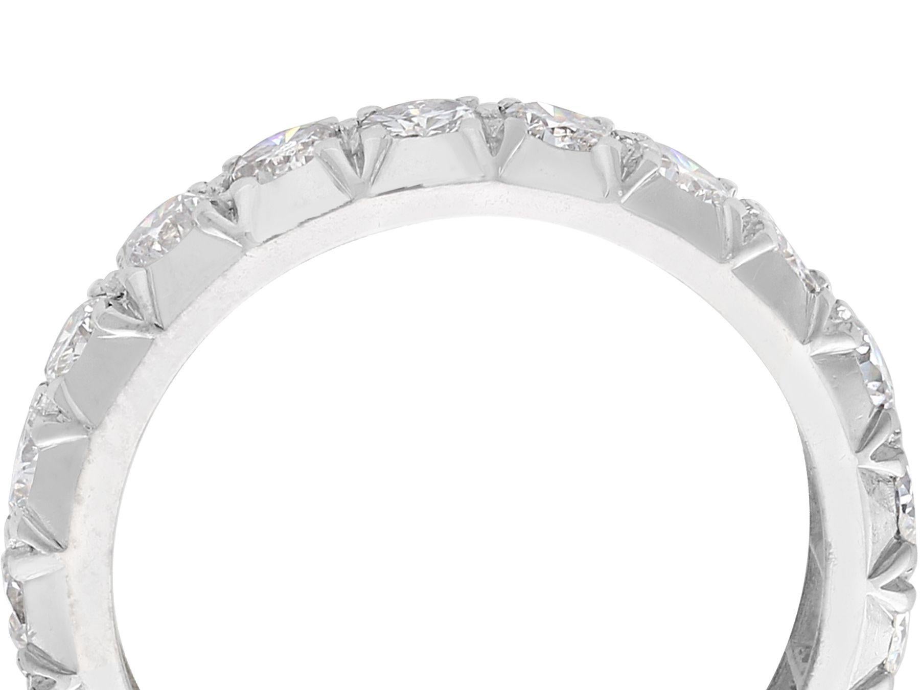 A fine and impressive vintage 1940s 1.45 carat diamond and 18 karat white gold full eternity ring; part of our diverse diamond jewelry and estate jewelry collections

This fine and impressive vintage eternity ring has been crafted in 18k white
