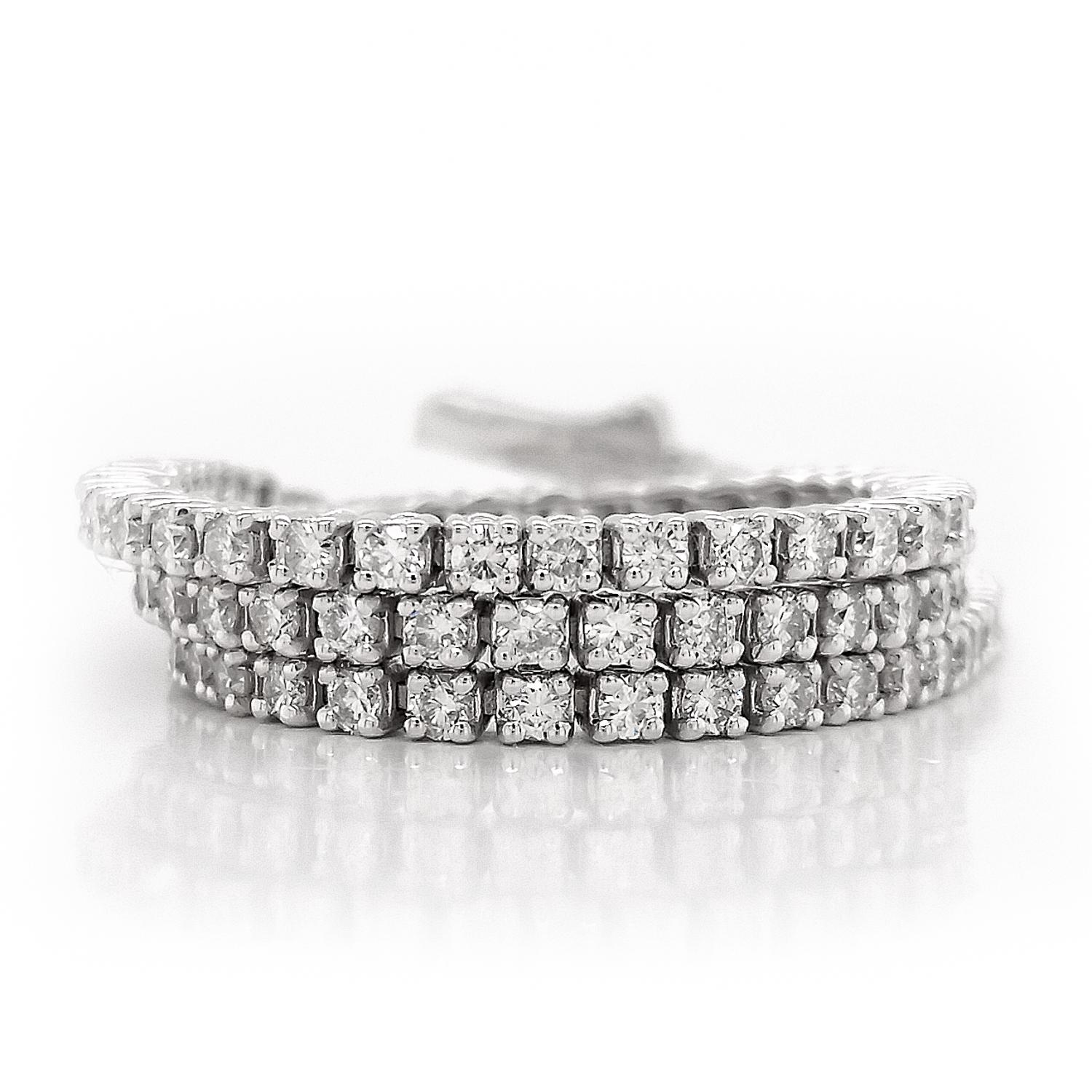FOR U.S. BUYERS NO VAT 

This classic and elegant 14kt white gold tennis bracelet showcases 100 endlessly sparkling diamonds, totaling 1.45carat. This bracelet will give your favorite outfits unforgettable sparkle. 
For more information, please