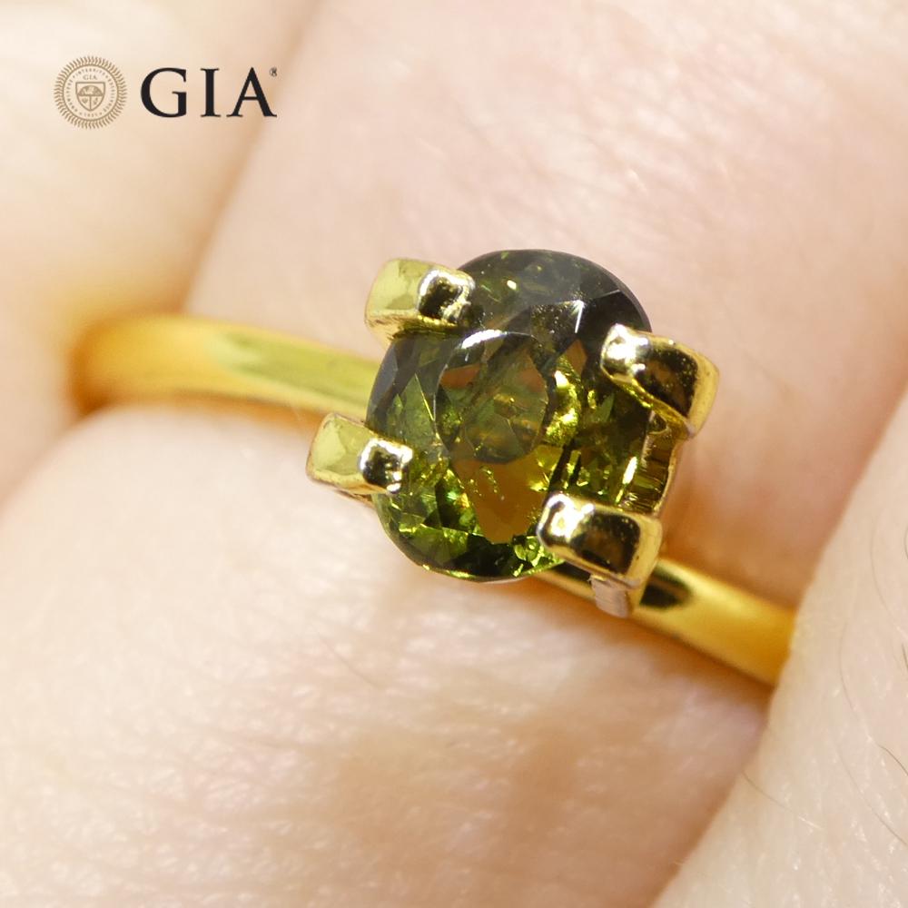 Contemporary 0.95ct Oval Yellowish Green to Yellow-Brown Alexandrite GIA Certified Sri Lanka For Sale