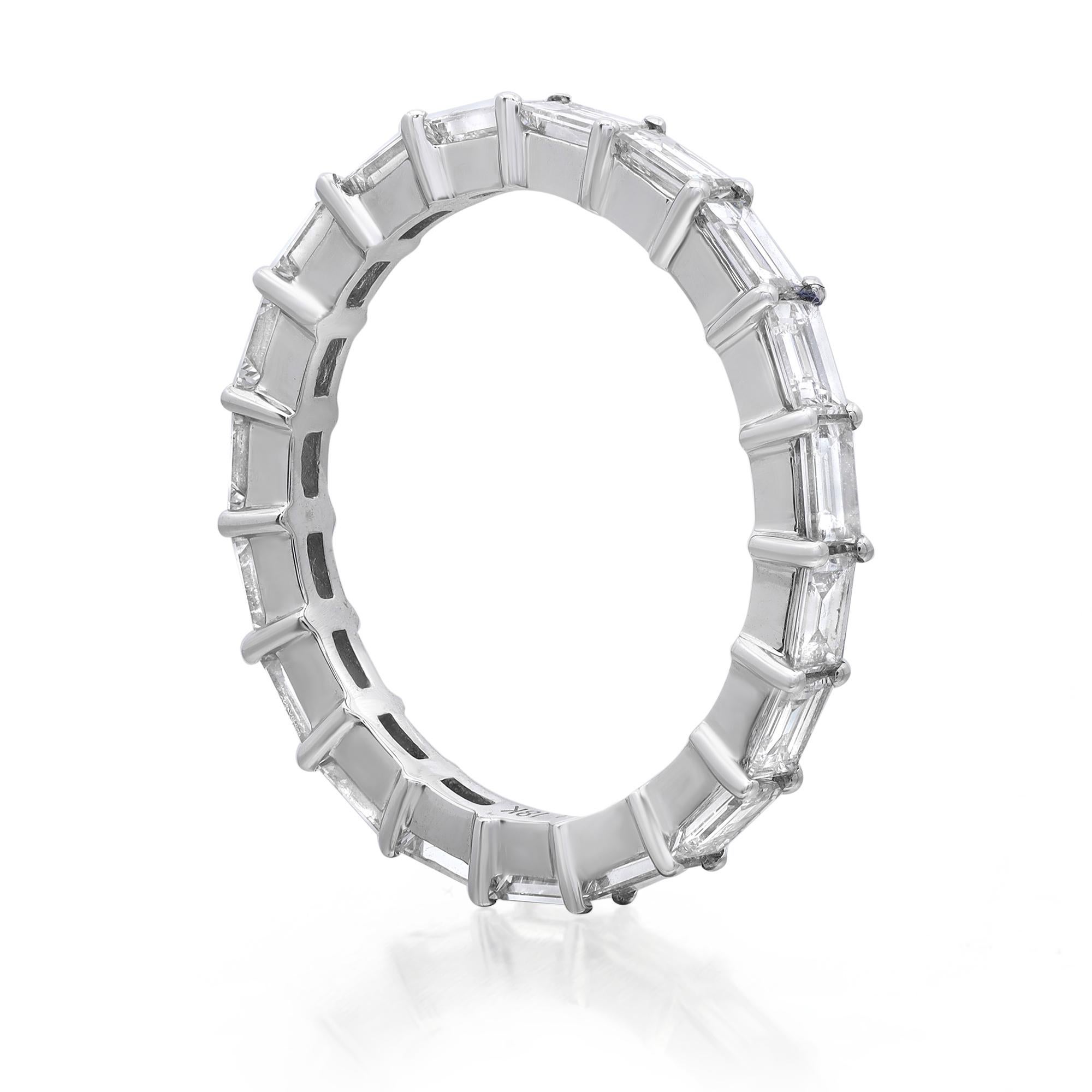 Desirable and unique Rachel Koen slim eternity band ring featuring 19 bright white scintillating Baguette cut diamonds in prong setting. One of a kind handmade stackable stunning beauty. Crafted in 18K white gold. Total diamond weight: 1.45 carats.