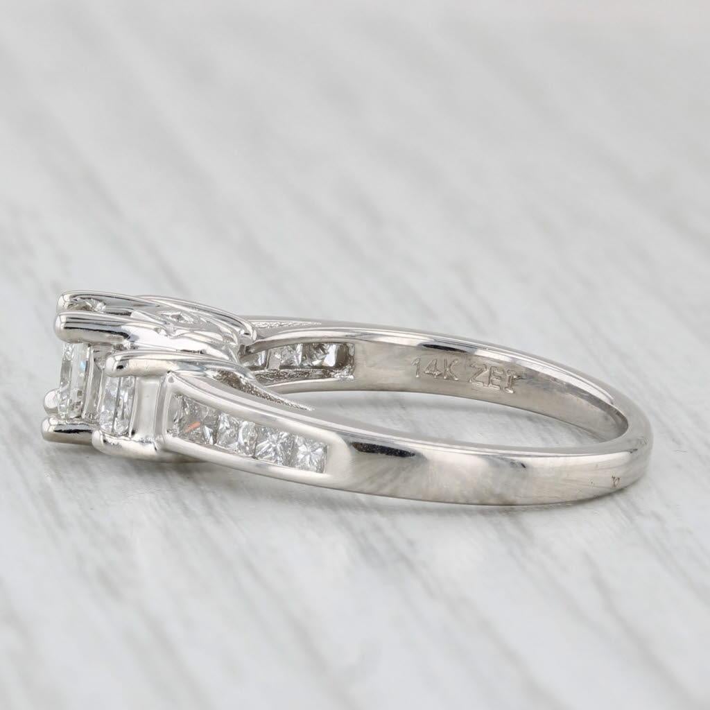 Gemstone Information:
- Natural Diamond -
Carats - 0.55ct
Cut - Princess Brilliant
Color - I - J
Clarity - SI2 

- Natural Diamonds -
Total Carats - 0.48ctw
Cut - Princess Brilliant
Color - G - H
Clarity - I1 - I2

- Natural Diamonds -
Total Carats
