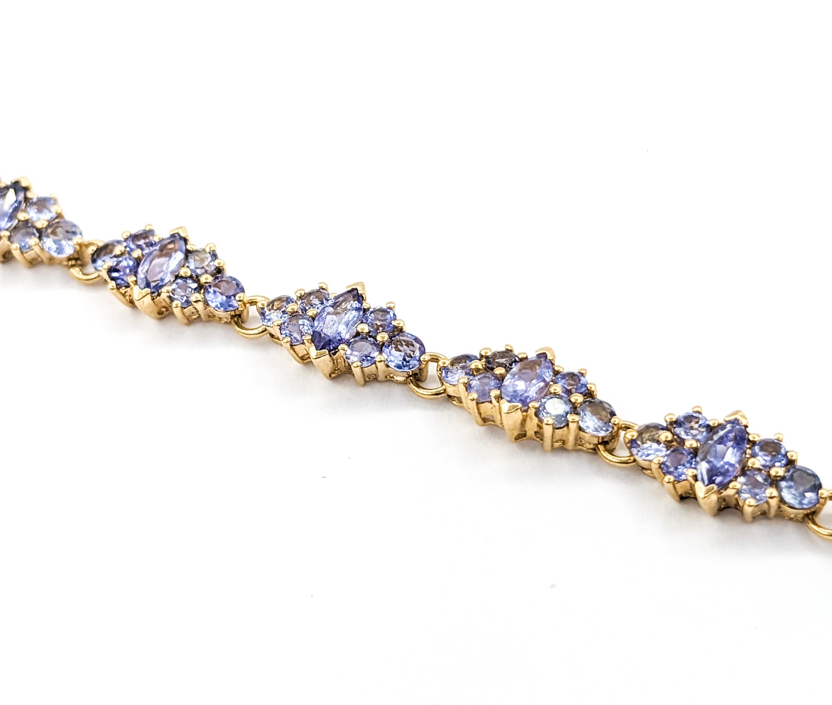 14.5ctw Tanzanite Bracelet In Yellow Gold

Introducing this stunning Gemstone Fashion Bracelet beautifully crafted in 14kt yellow gold. This elegant piece is adorned with 14.5 carats of tanzanite, showcasing deep, vibrant hues that captivate and