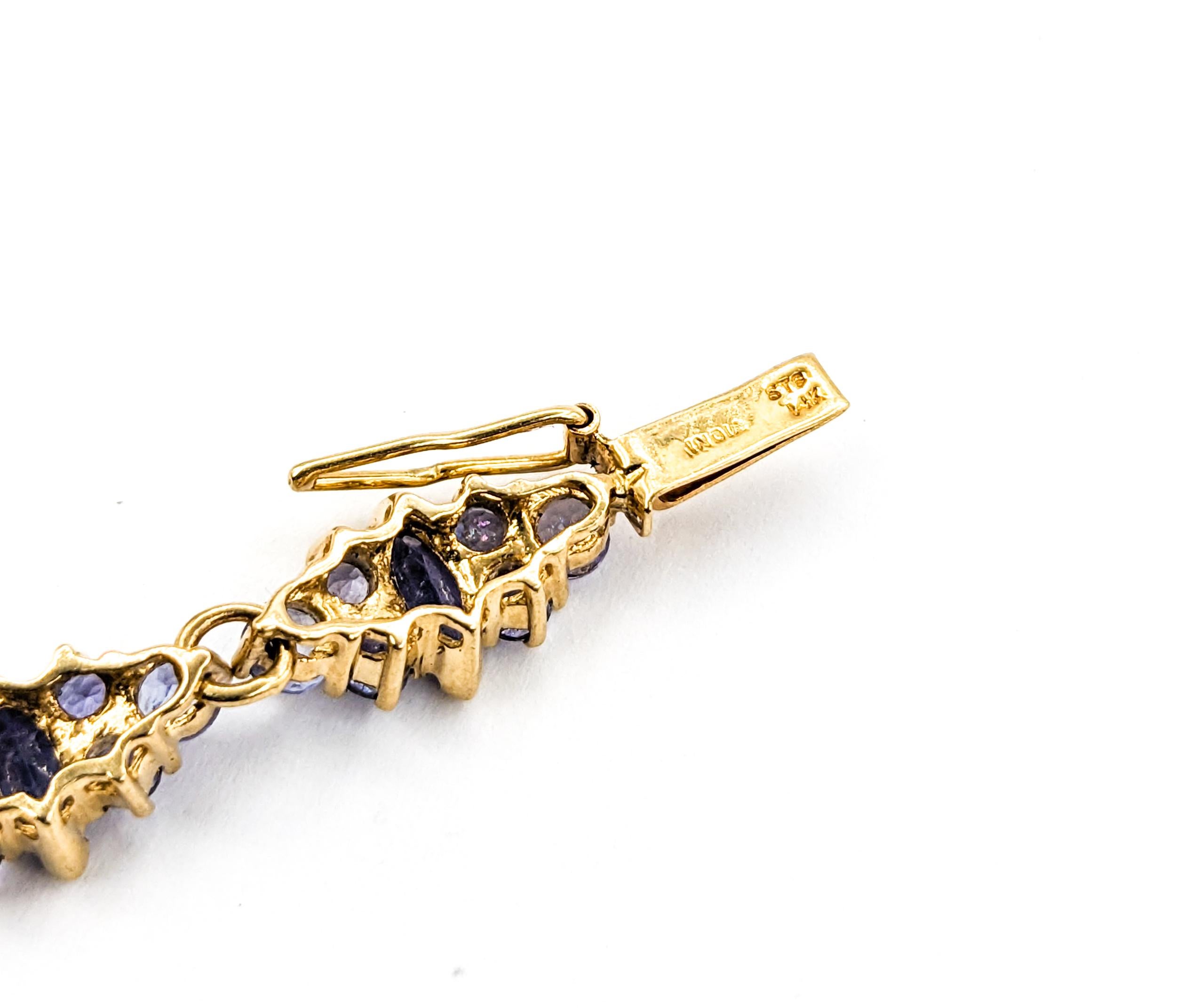 Marquise Cut 14.5ctw Tanzanite Bracelet In Yellow Gold For Sale