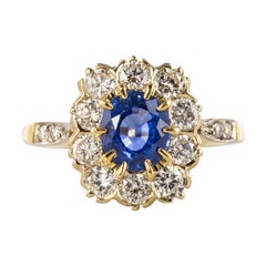 1.46 Carat Blue Sapphire Diamonds 18 Karat Yellow Gold Daisy Ring