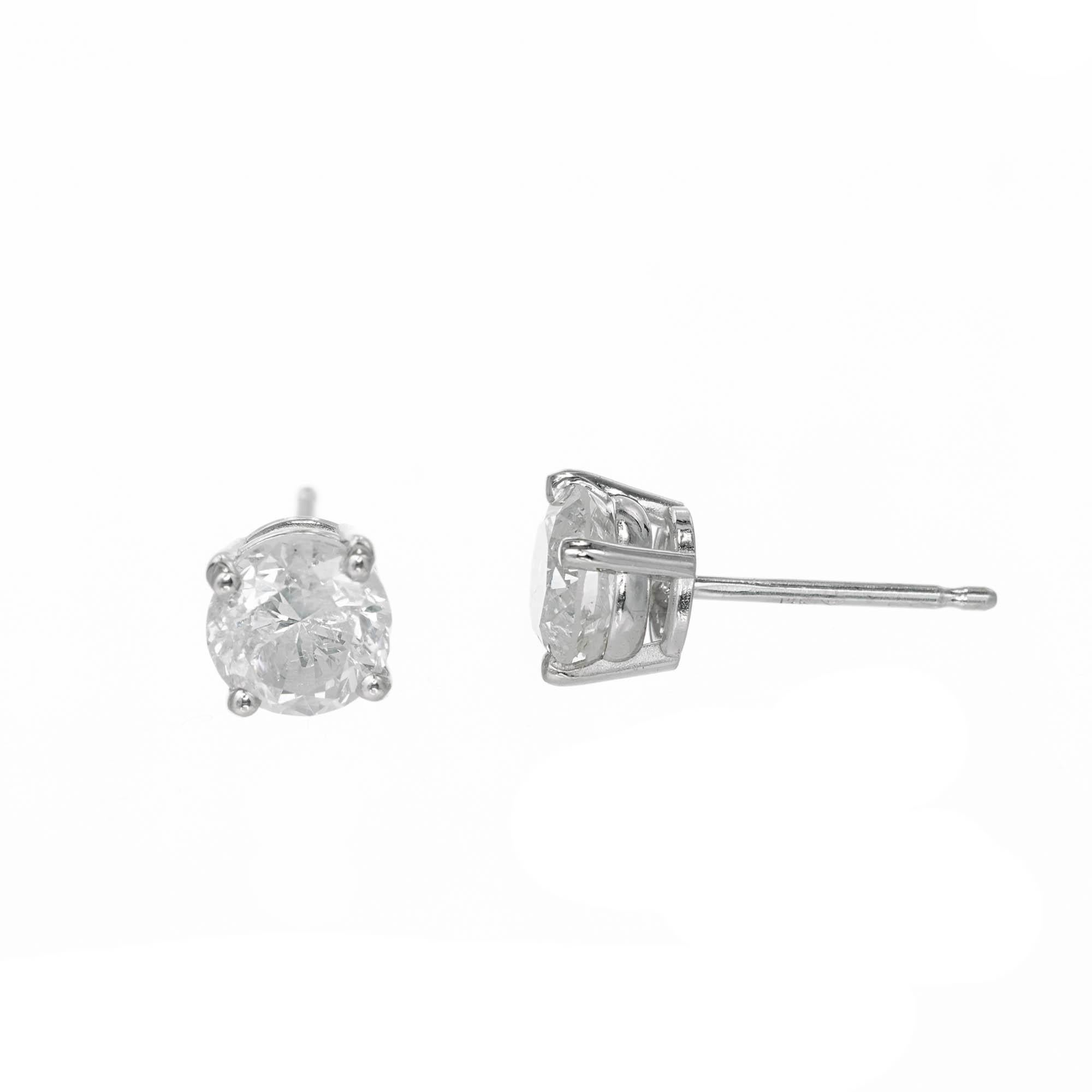 Round brilliant cut diamond stud earrings set in a 14k white gold 4 prong setting

1 round diamond I2 5.42-5.40 x 3.8 approximate .75 carats EGL #  US 314545201J
1 round diamond G-H I2 5.42-5.38 x3.65 approximate .71 carats EGL # US 314545201J
14k