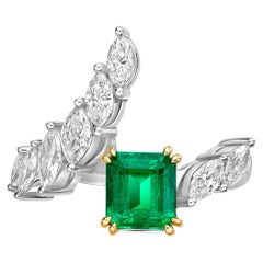 1.46 Carat Emerald Fancy Ring in 18Karat Yellow Gold with White Diamond.