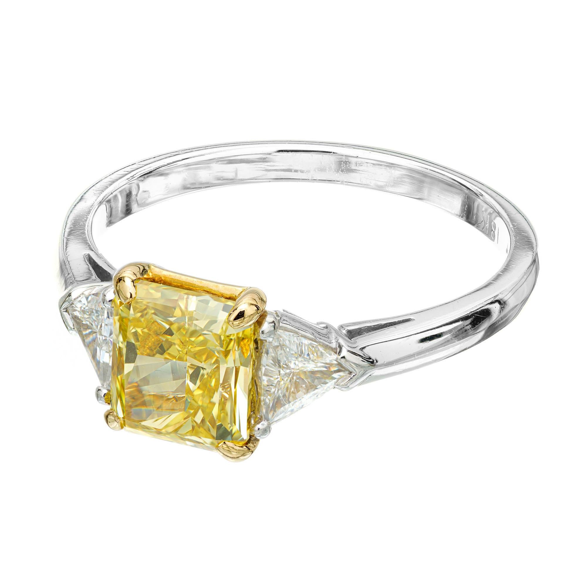 1.46 Carat Fancy Yellow Diamond Three-Stone Platinum Engagement Ring In Excellent Condition For Sale In Stamford, CT