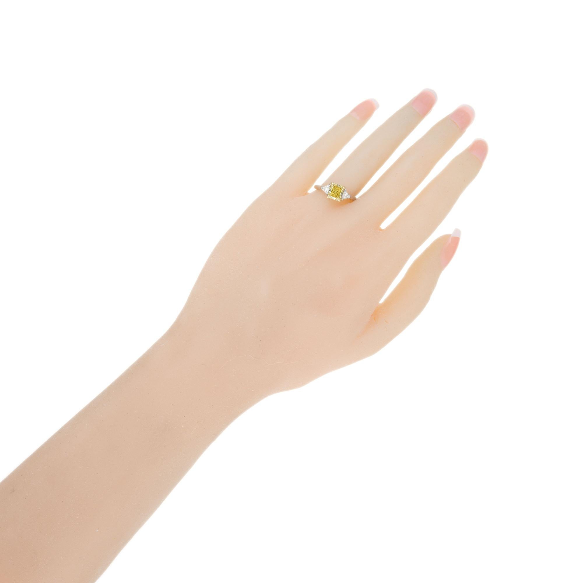 1.46 Carat Fancy Yellow Diamond Three-Stone Platinum Engagement Ring For Sale 3