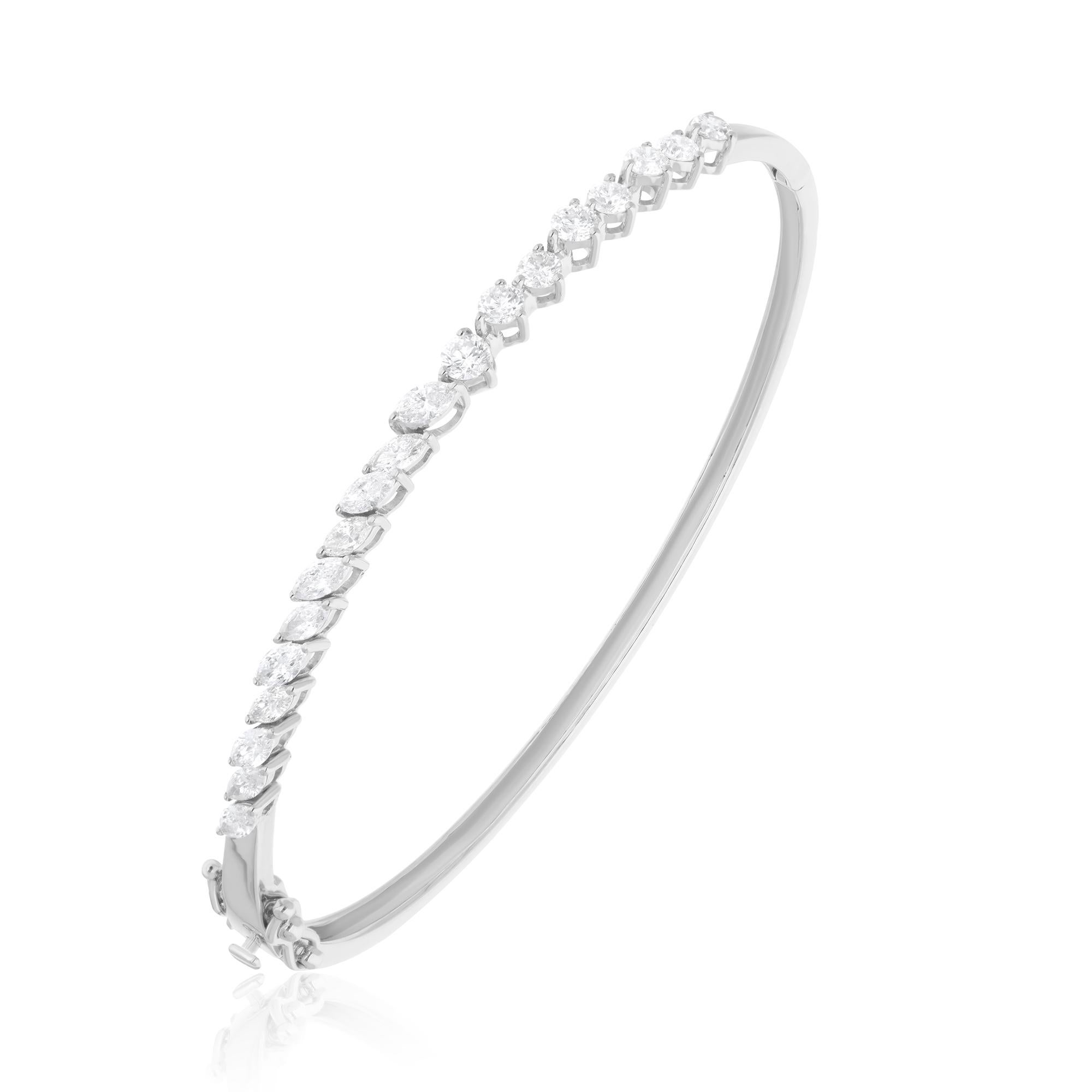 Cast from 18-karat gold, these exquisite bangle is handset with 1.46 carats of sparkling diamonds.

FOLLOW SPECTRUM JEWELS storefront to view the latest collection & exclusive pieces. Spectrum Jewels is proudly rated as a Top Seller on 1stdibs with