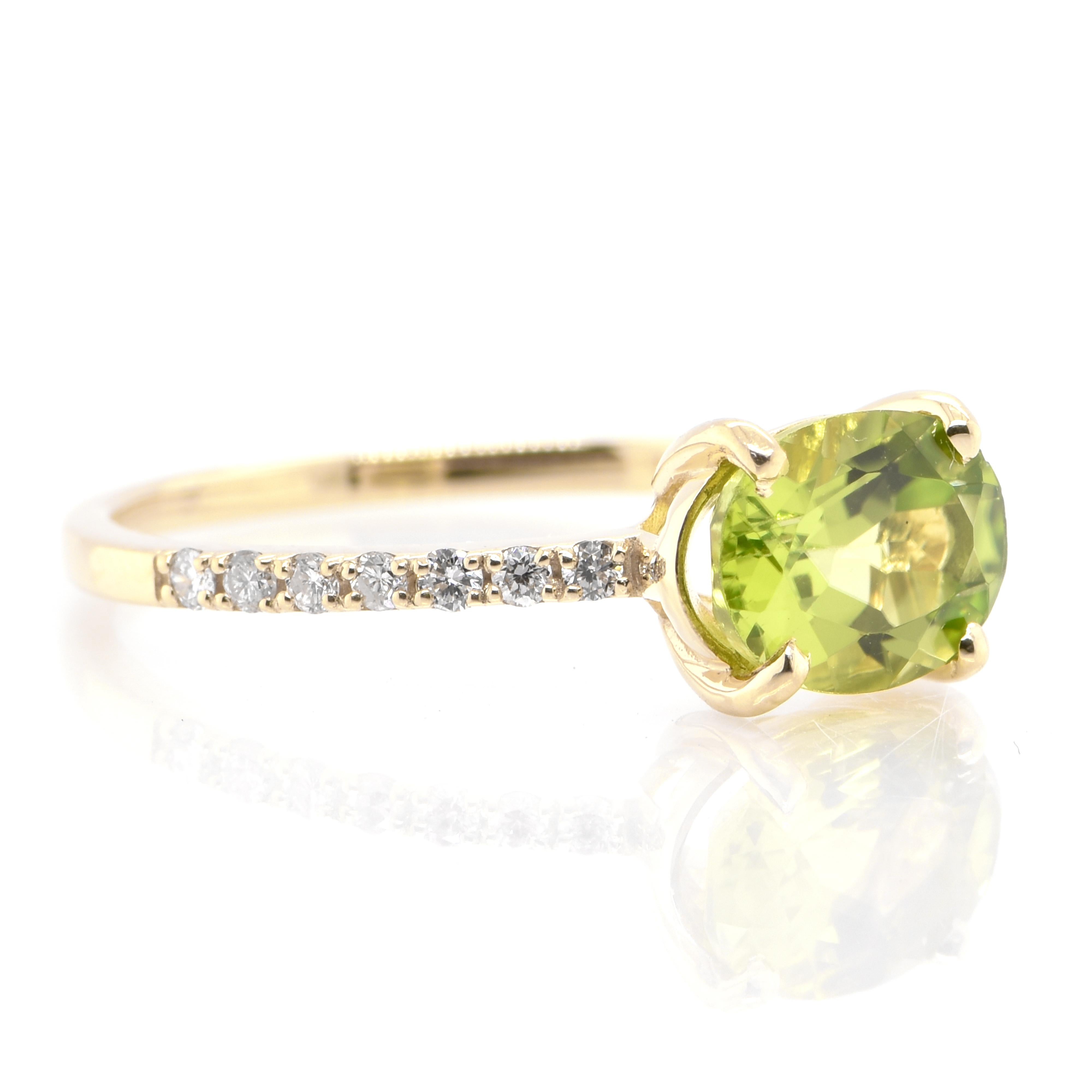 A beautiful Engagement Ring featuring a 1.46 Carat, Natural Peridot and 0.14 Carats of Diamond Accents set in 18 Karat Yellow Gold. From the earliest times, people confused Peridot with other gems such as Emerald and Topaz. Some historians believe