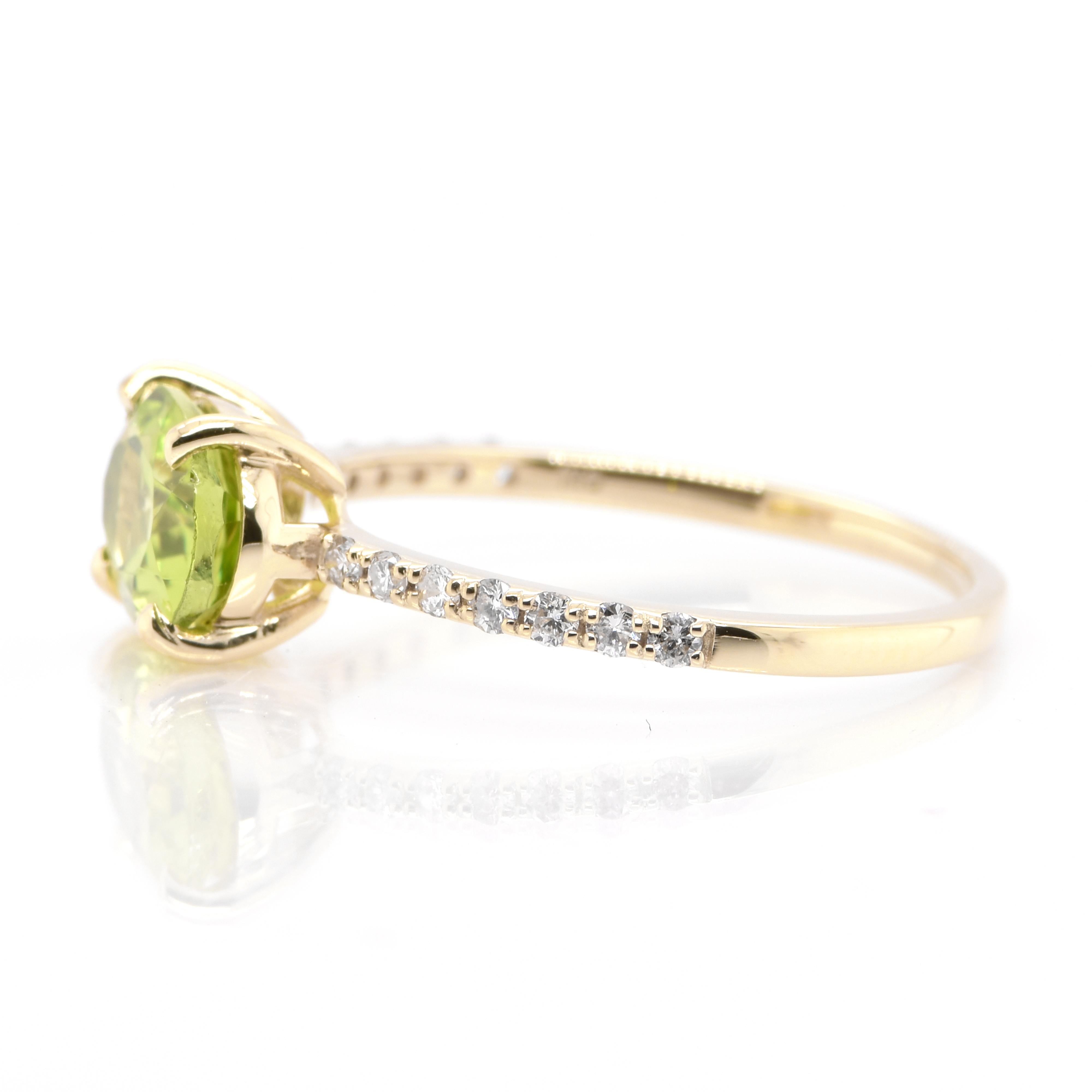 Oval Cut 1.46 Carat Natural Peridot and Diamond Ring Set in 18 Karat Gold For Sale