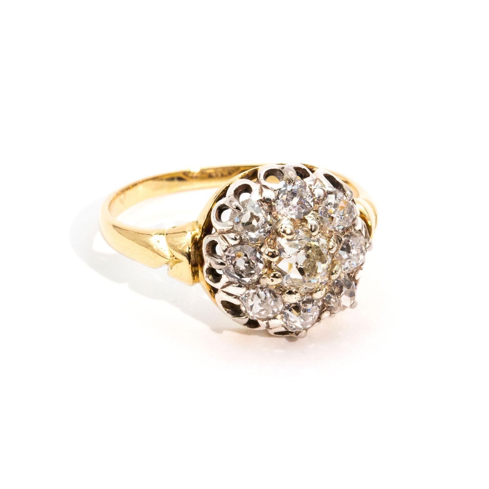 Forged in 18 carat gold is this wondrous cluster ring flaunting nine romantic claw set old cut diamonds totalling 1.46 carats.  We have named this piece of vintage fineness The Catherine Ring. The Catherine Ring is a traditional and classic ring
