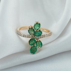 1.46 Carat Zambian Emerald 0.17 Carat SI/H Diamond Ring 14 Karat Yellow Gold