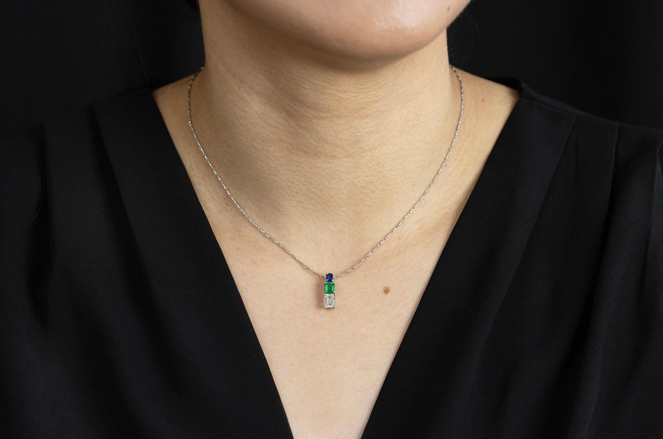 Contemporary 1.46 Carats Total Emerald Cut Emerald, Blue Sapphire & Diamond Pendant Necklace For Sale