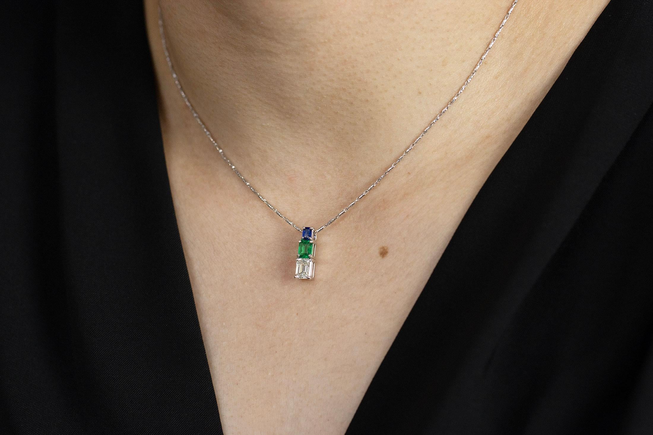 Women's 1.46 Carats Total Emerald Cut Emerald, Blue Sapphire & Diamond Pendant Necklace For Sale