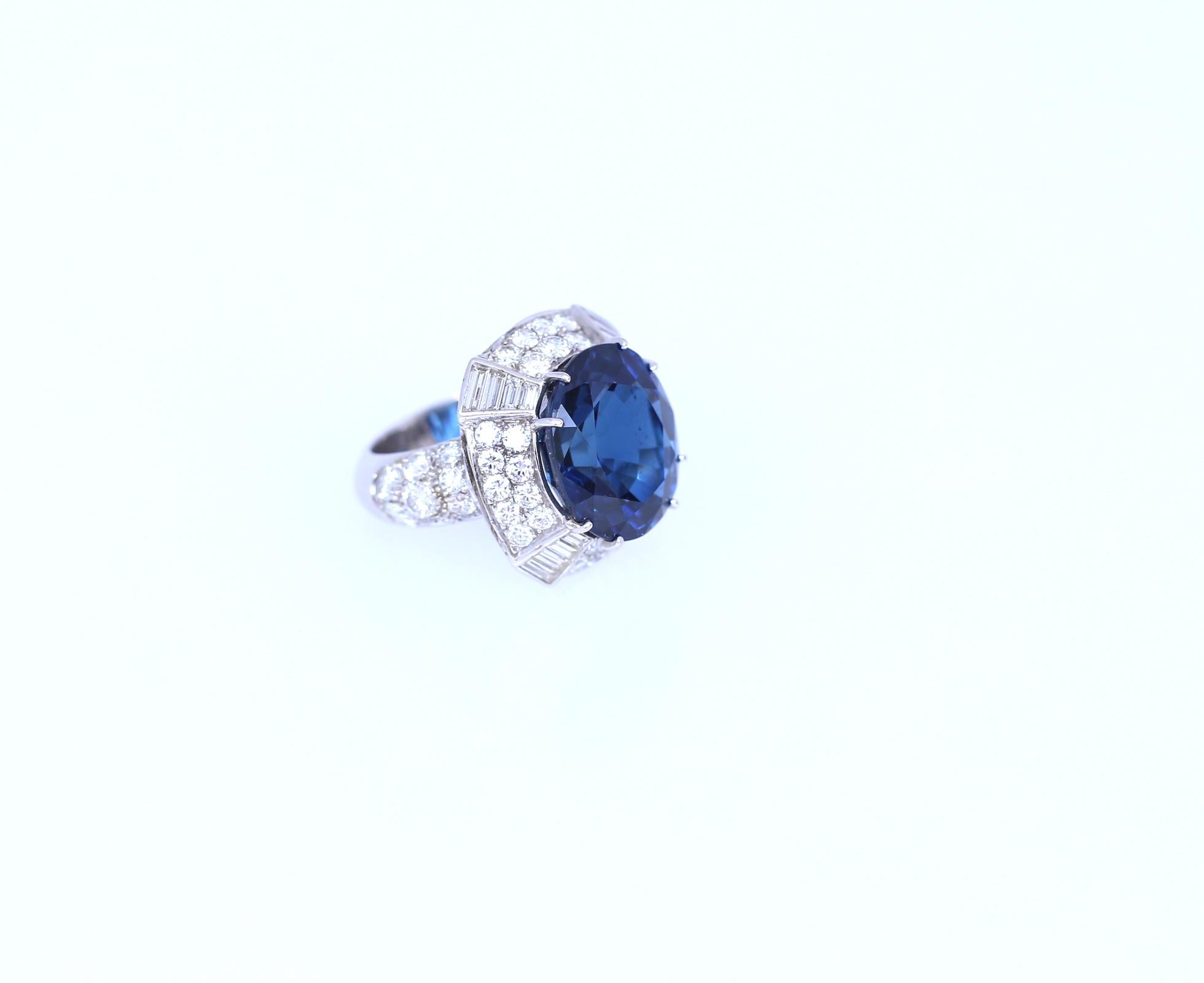 Certified Natural Sapphire Diamond Ring
Magnificent and important natural Sapphire and Diamonds ring. Holds a Certificate of the SGL (Swiss Gem Lab) stating:

Natural Sapphire weighing 14.6 Carats.
50 Diamonds with a total weight of 3.56 Carats.
18
